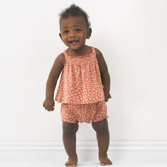 Child wearing a Desert Leopard smocked top with shorty bloomer