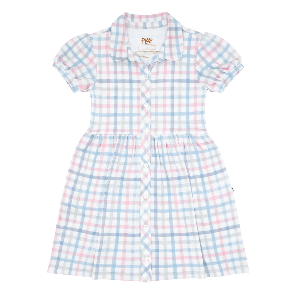 Flat lay image of a Playful Plaid puff sleeve button down dress