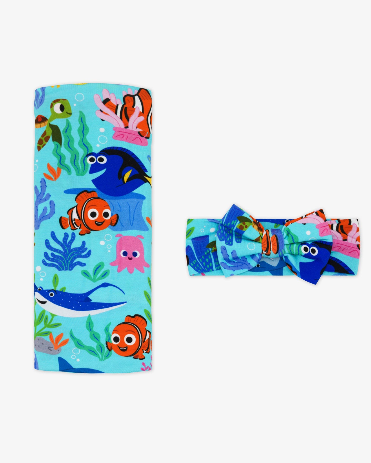 Flat lay of the Disney Nemo's Reef Swaddle & Luxe Bow Headband Set