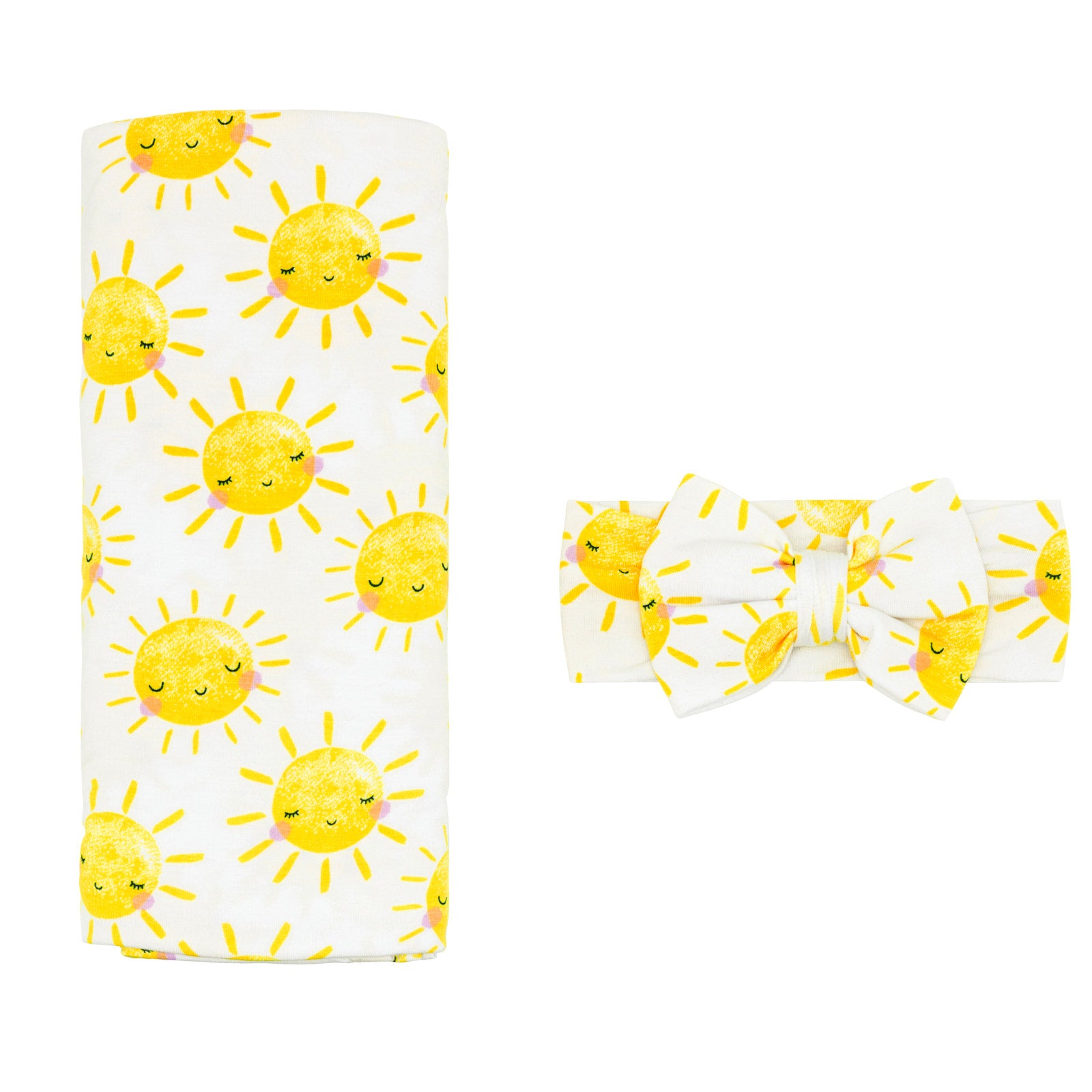 Flat lay image of a Sunshine Swaddle and Luxe Bow Headband Set