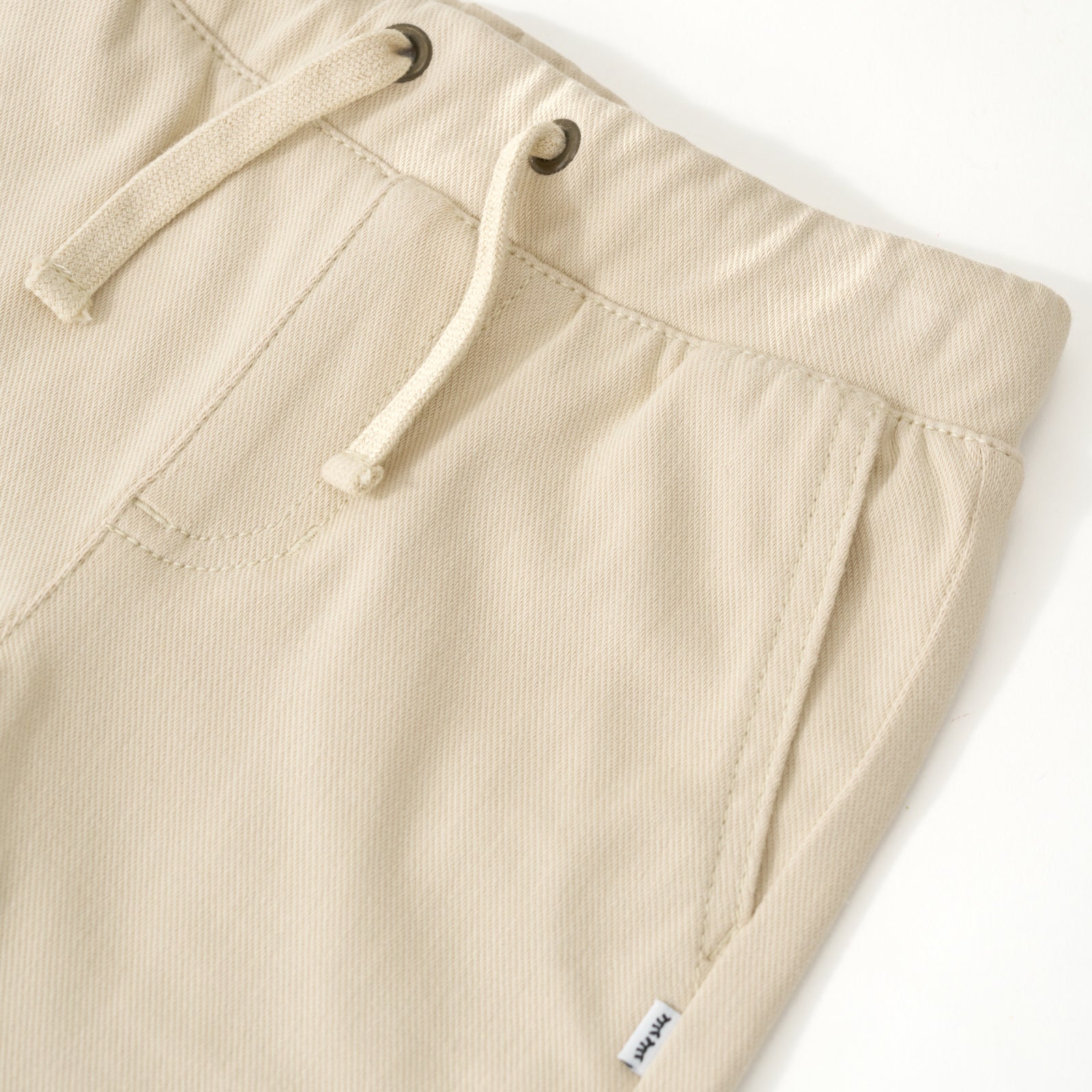 Close up image of the pocket detail for theLight Khaki Chino Shorts