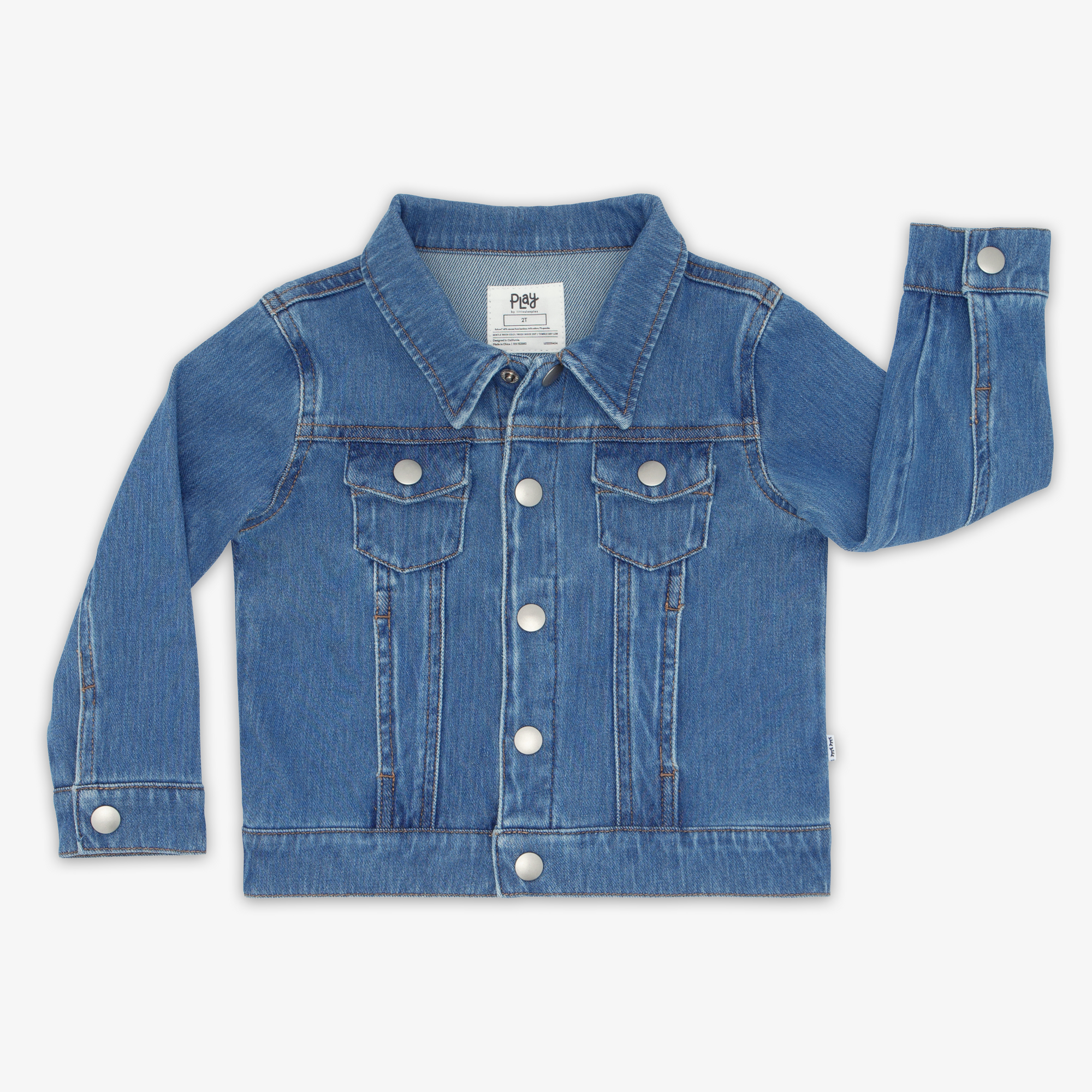 Flat lay of the Midwash Blue Denim Trucker Jacket