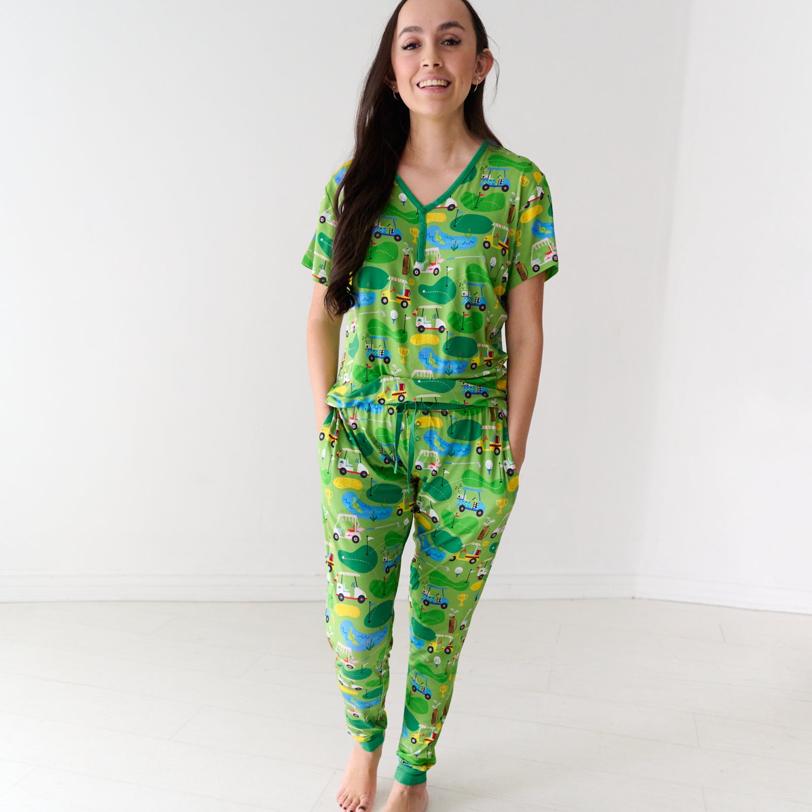 Woman wearing a Fairway Fun women's short sleeve pajama top and matching pajama pants
