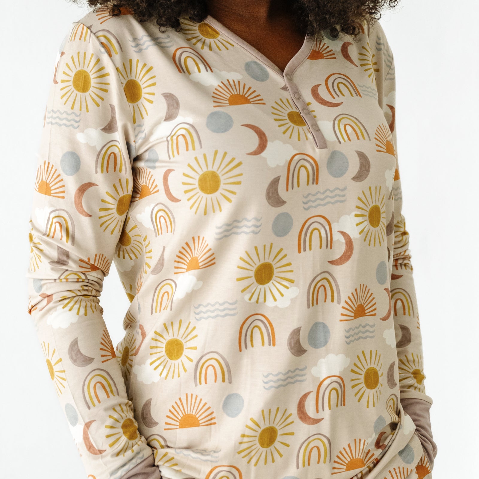 Close up image of a woman wearing a Desert Sunrise women's pajama top