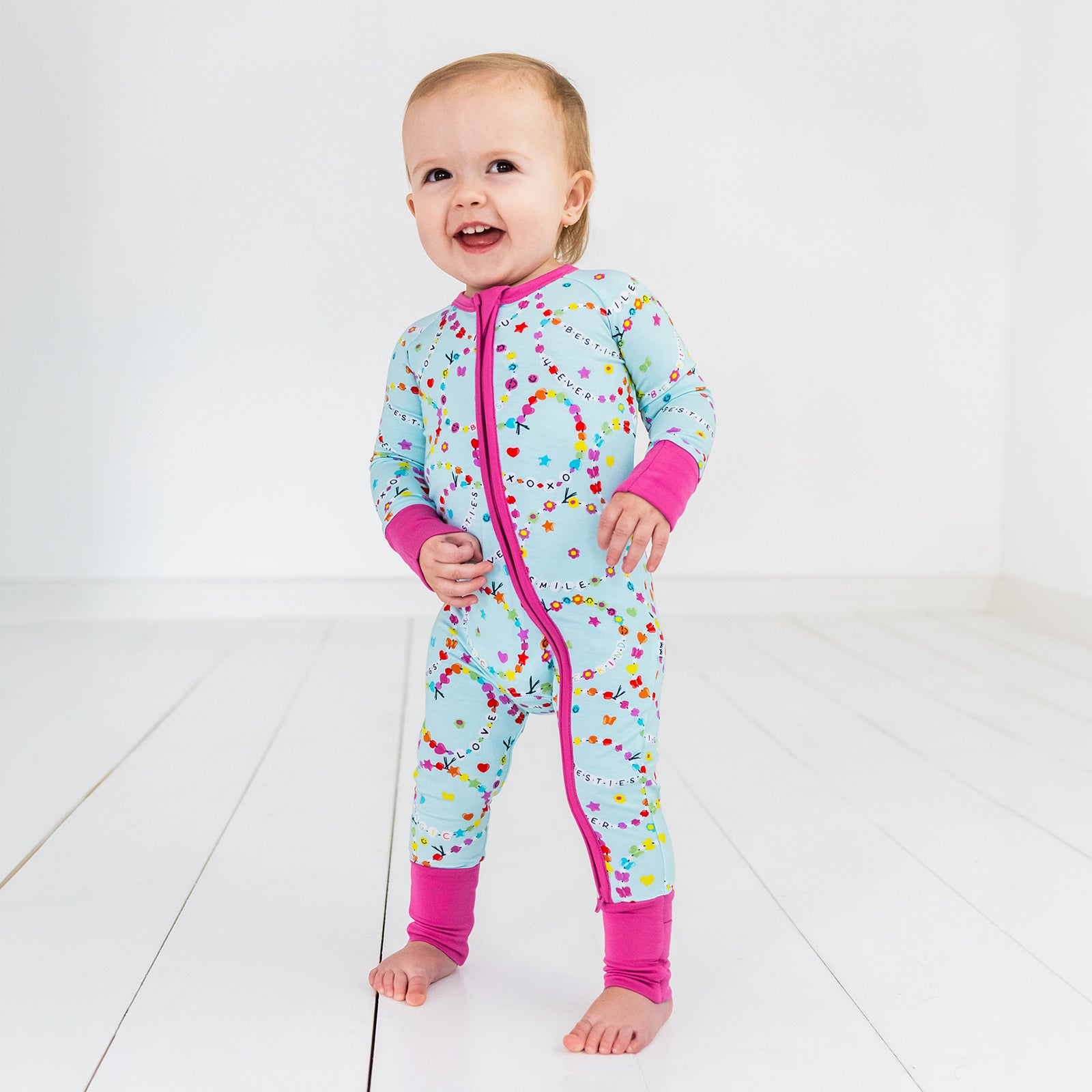 Standing toddler wearing the Friends Forever Zippy