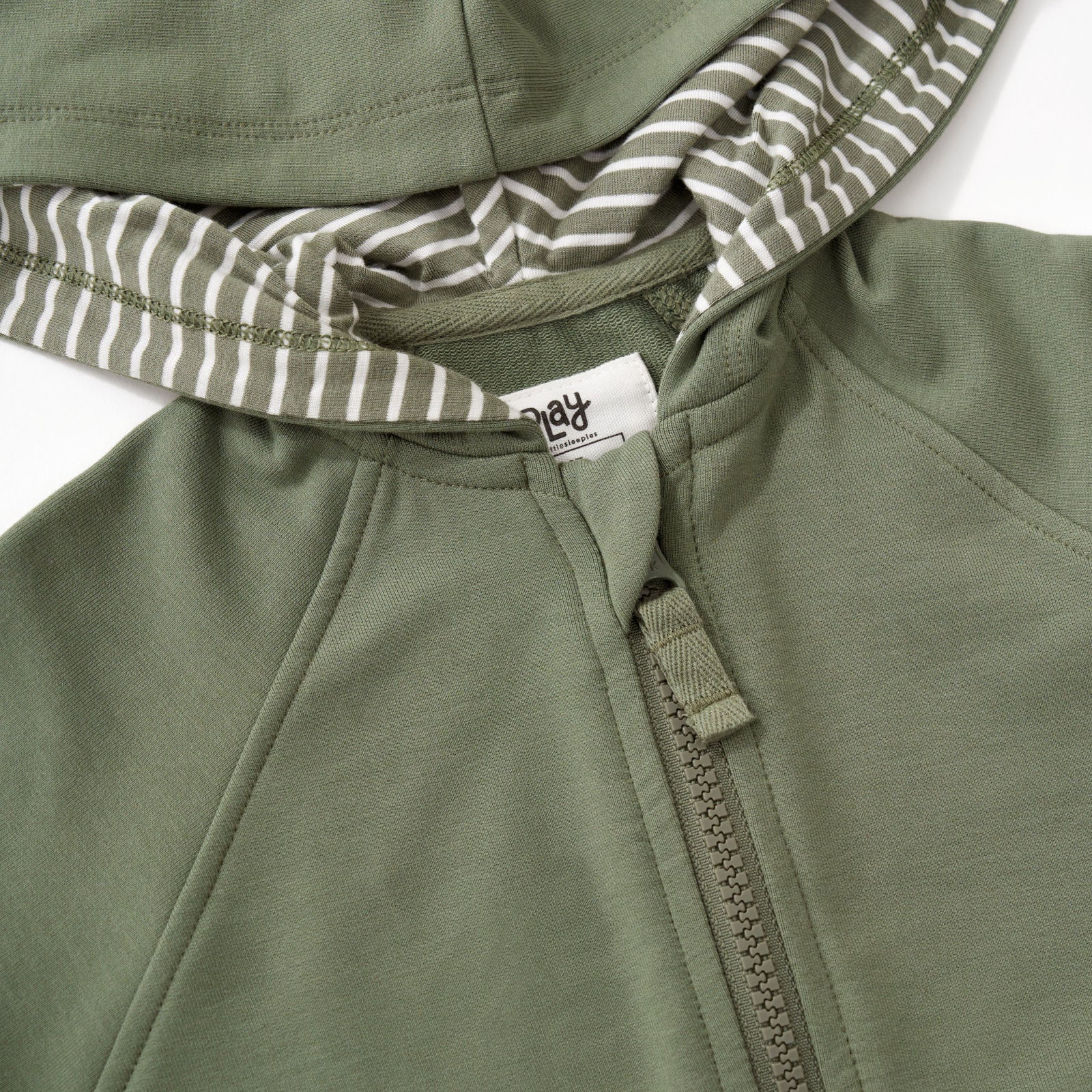 Close up image of the hoodie detail for the Moss Zip Hoodie