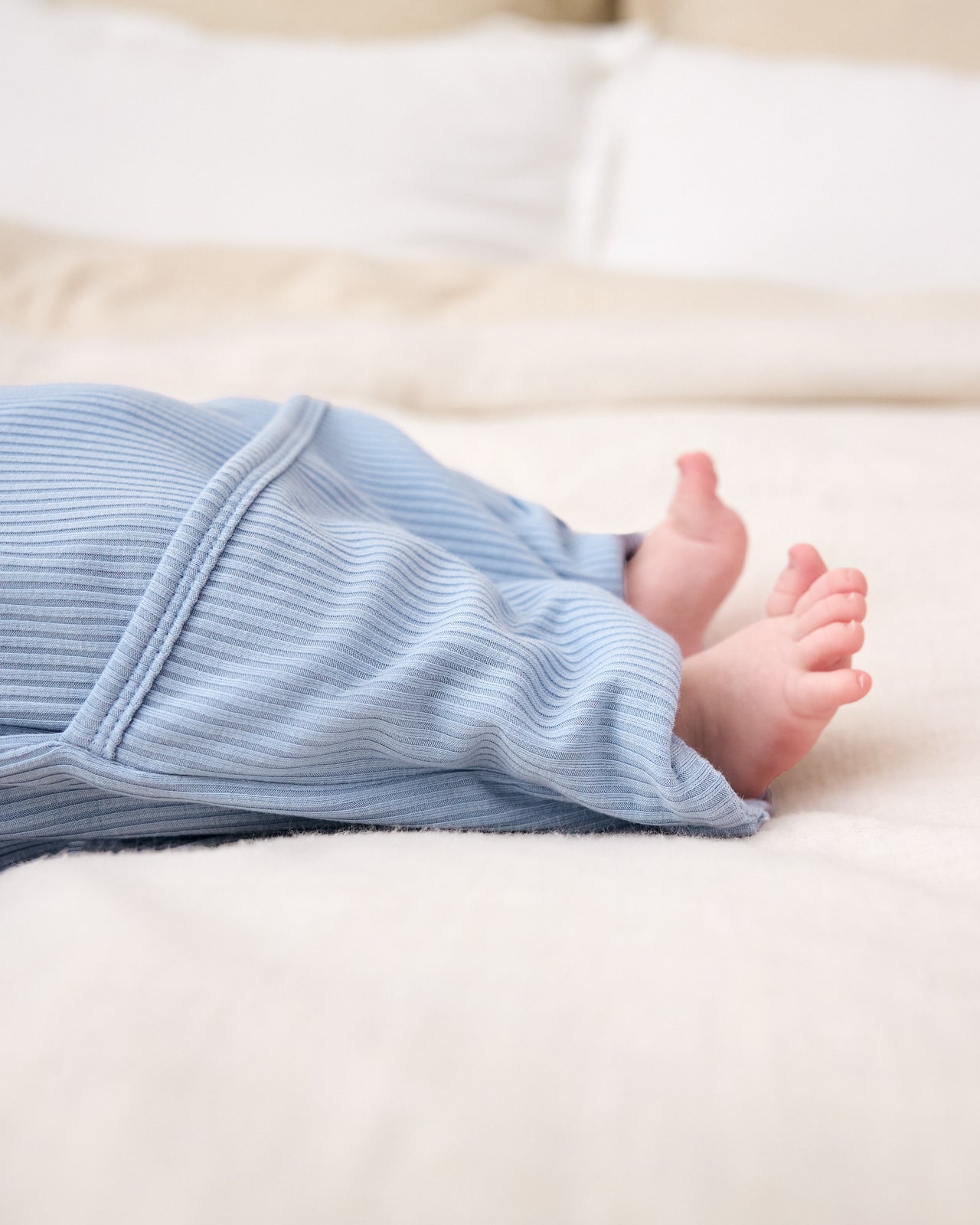 Close up of the envelope sweet on the Light Fog Ribbed Infant Gown