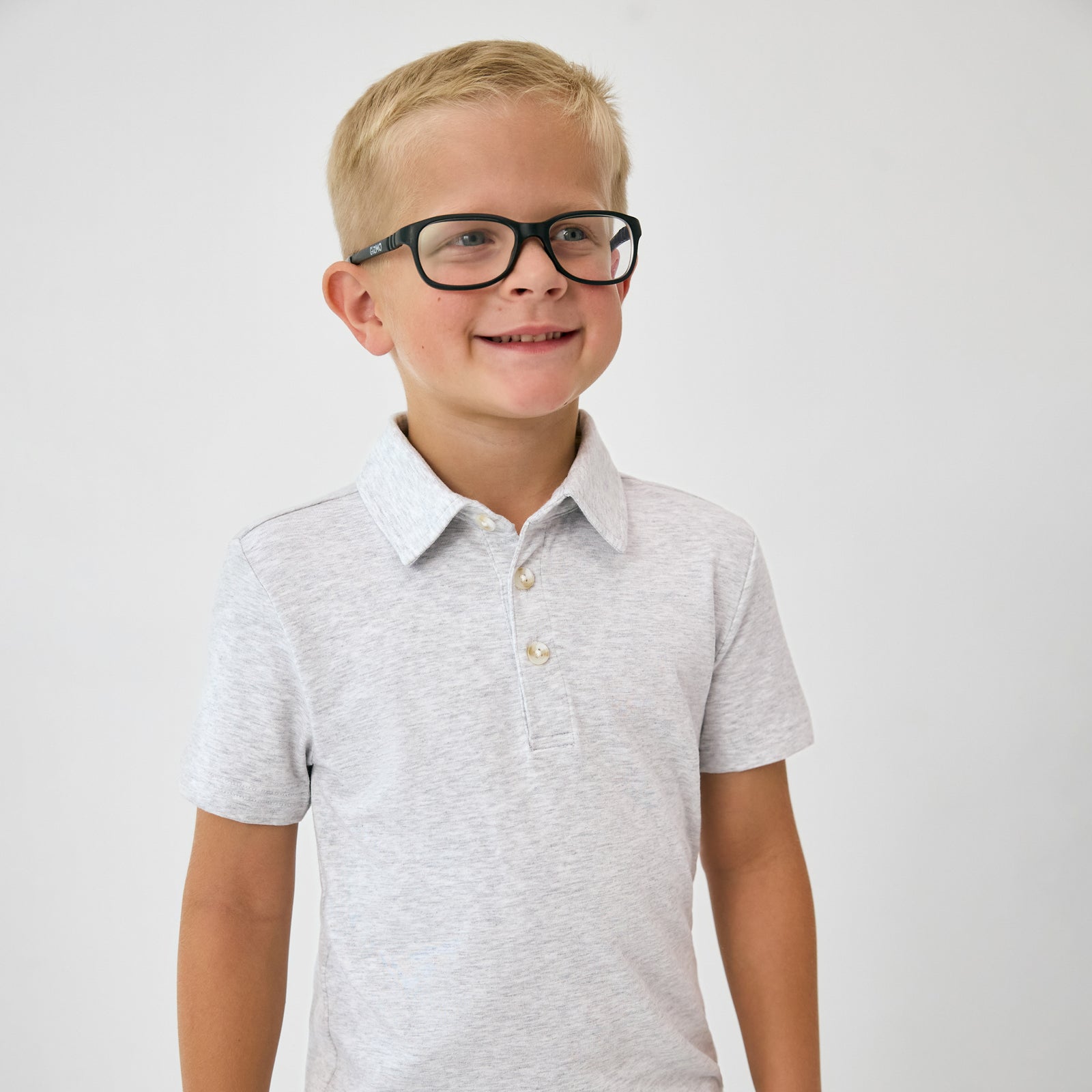 Close up of child wearing the Light Heather Gray Polo Shirt with glasses