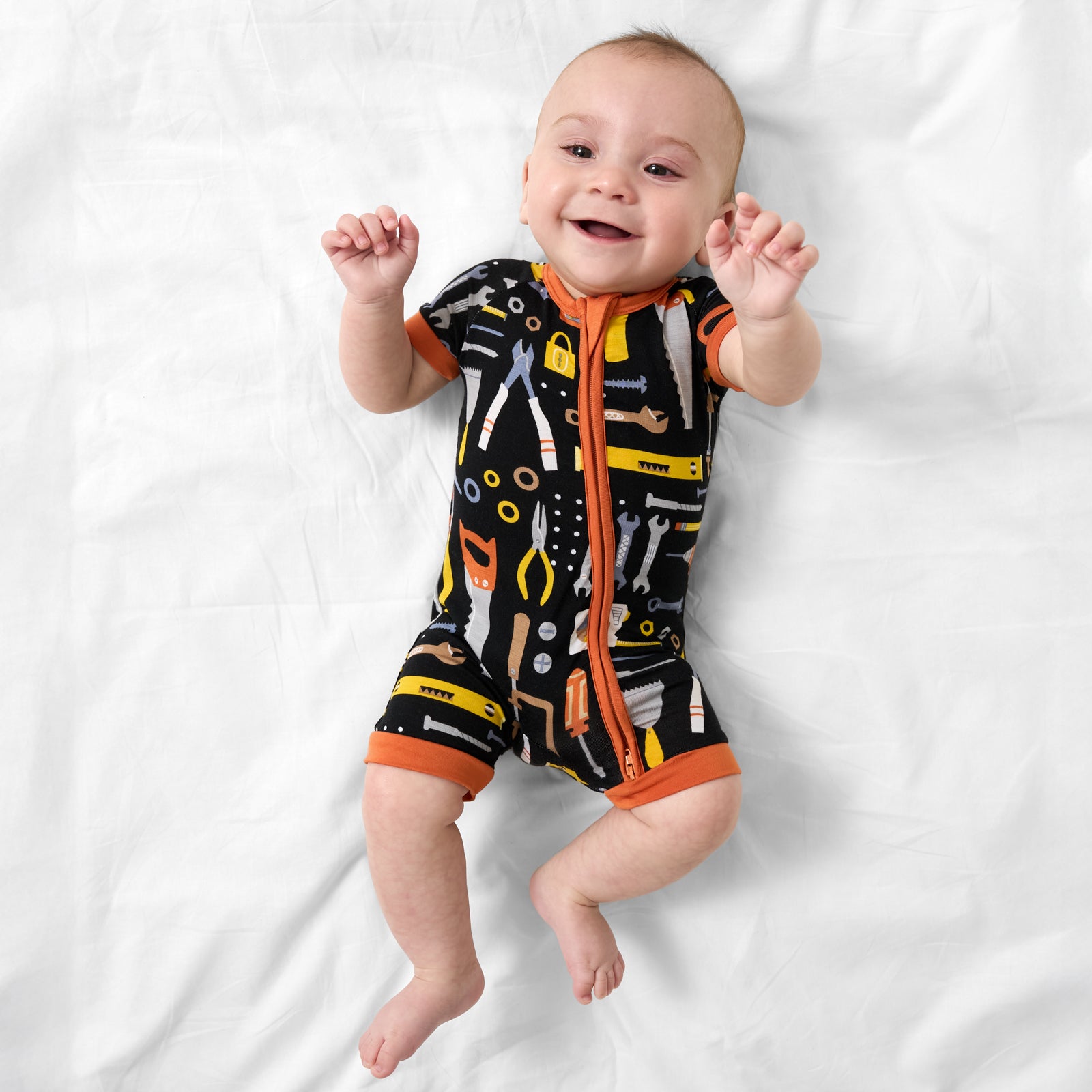 Aerial view of child wearing the Little Builders Shorty Zippy