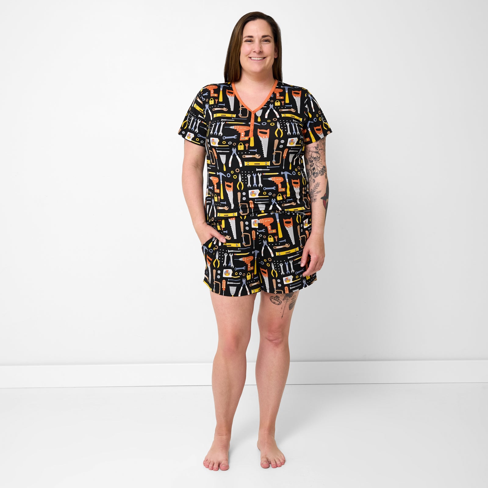 Standing woman wearing the Little Builders Women's Pajama Shorts