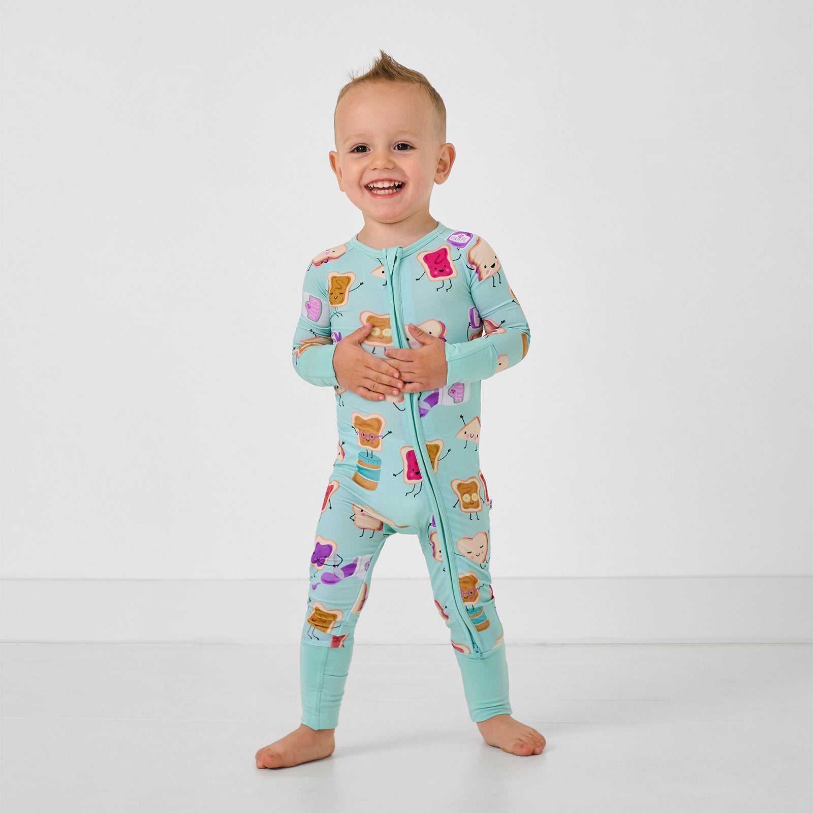 Standing child wearing the Lunch Buddies Zippy