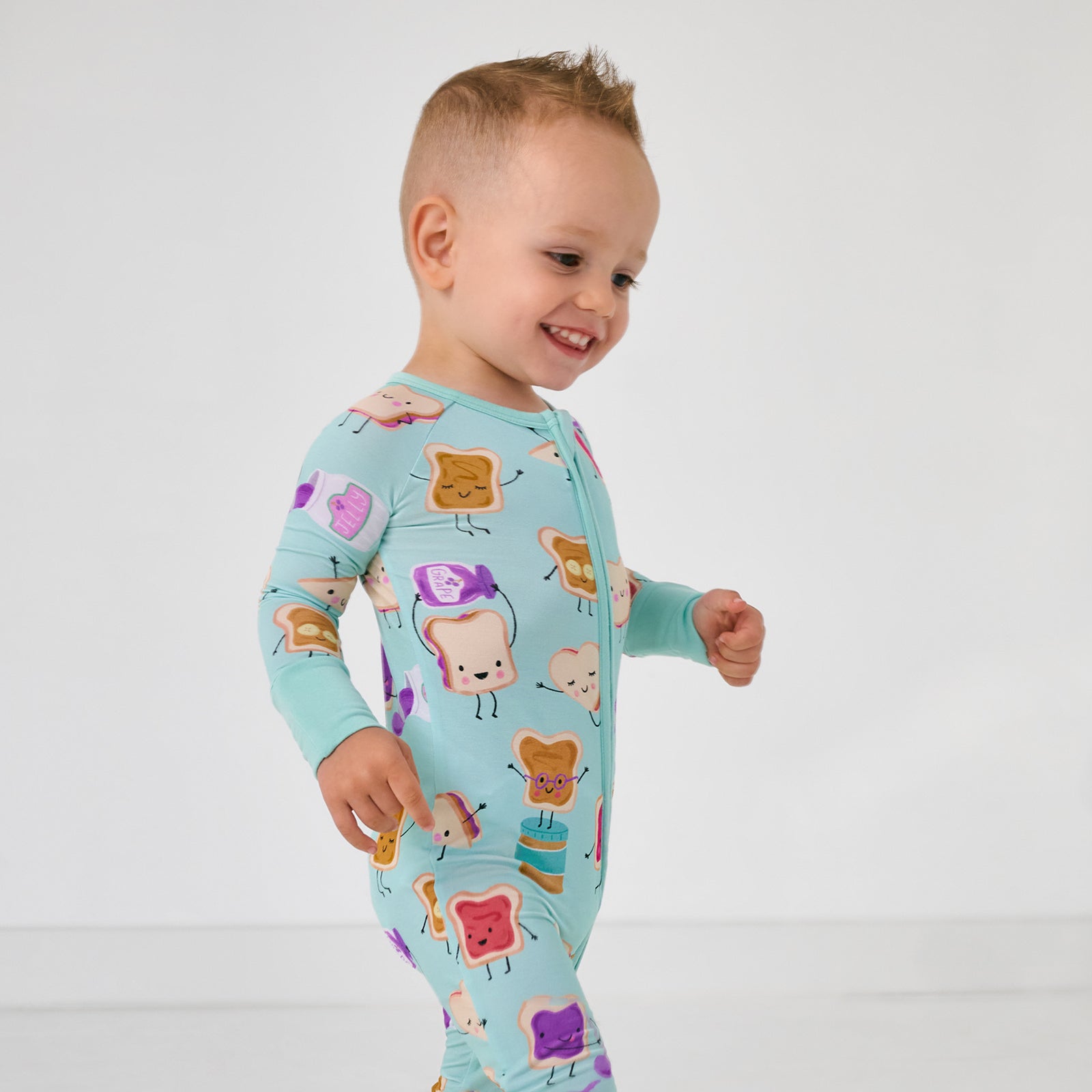 Walking child wearing thenLunch Buddies Zippy