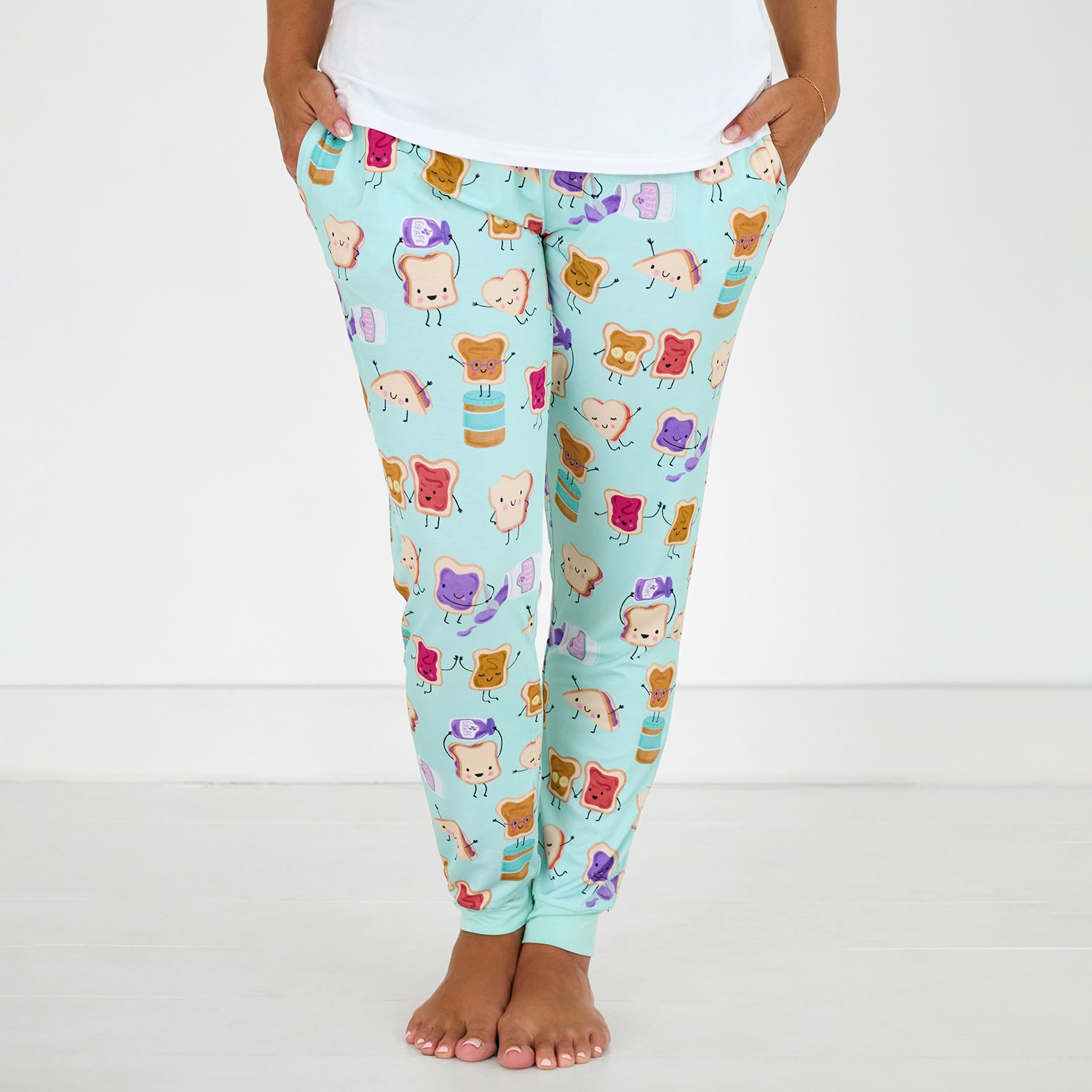 Front view of standing woman wearing the Lunch Buddies Women's Pajama Pants
