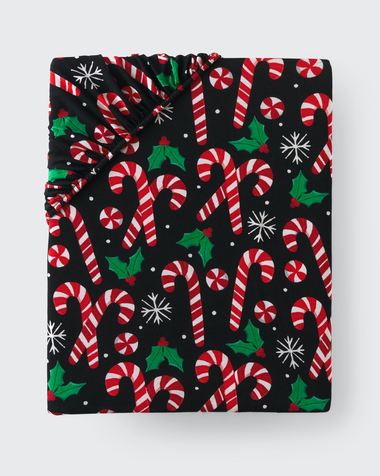 Flat lay of the Merry Mints Fitted Crib Sheet