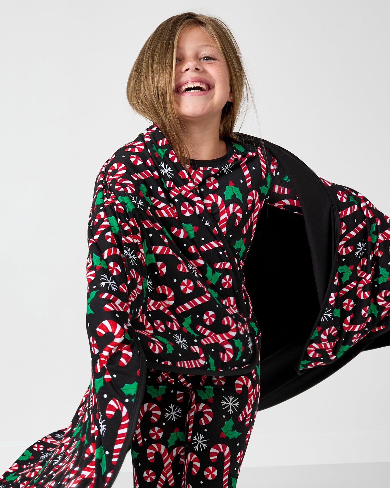 Alternate of girl wrapped in the Merry Mints Large Cloud Blanket®