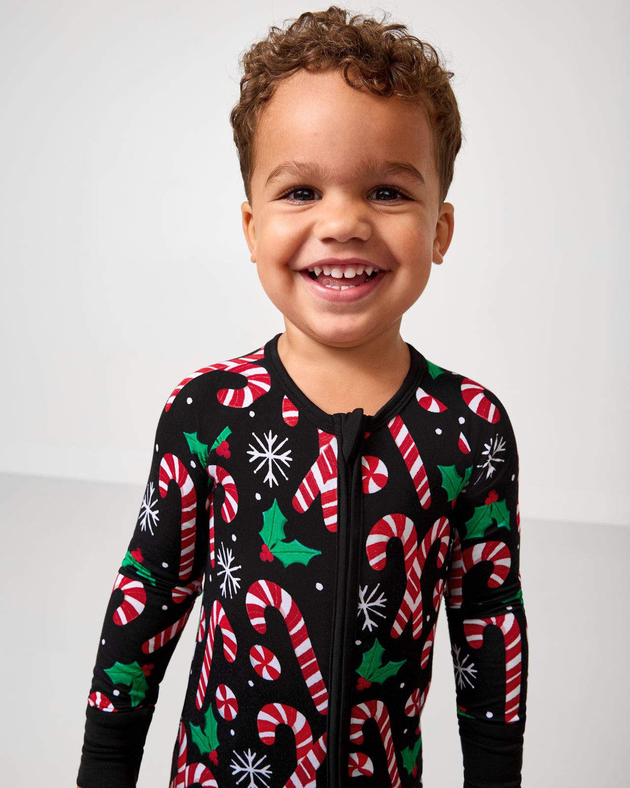 Close up of boy wearing the Merry Mints Zippy