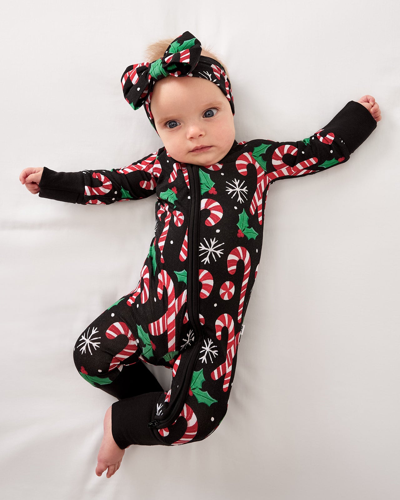 Aerial view of baby wearing the Merry Mints Zippy