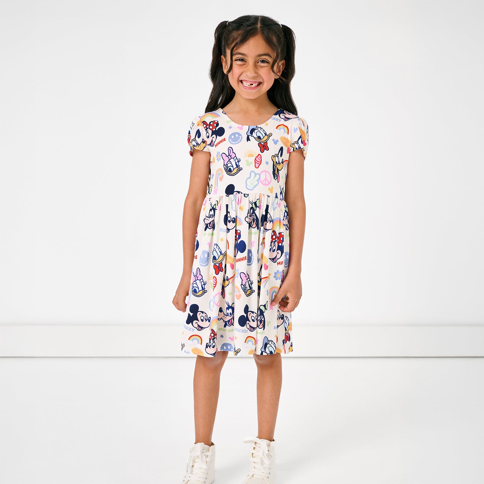 Girl wearing the Disney Mickey's Clubhouse Bow Back Skater Dress