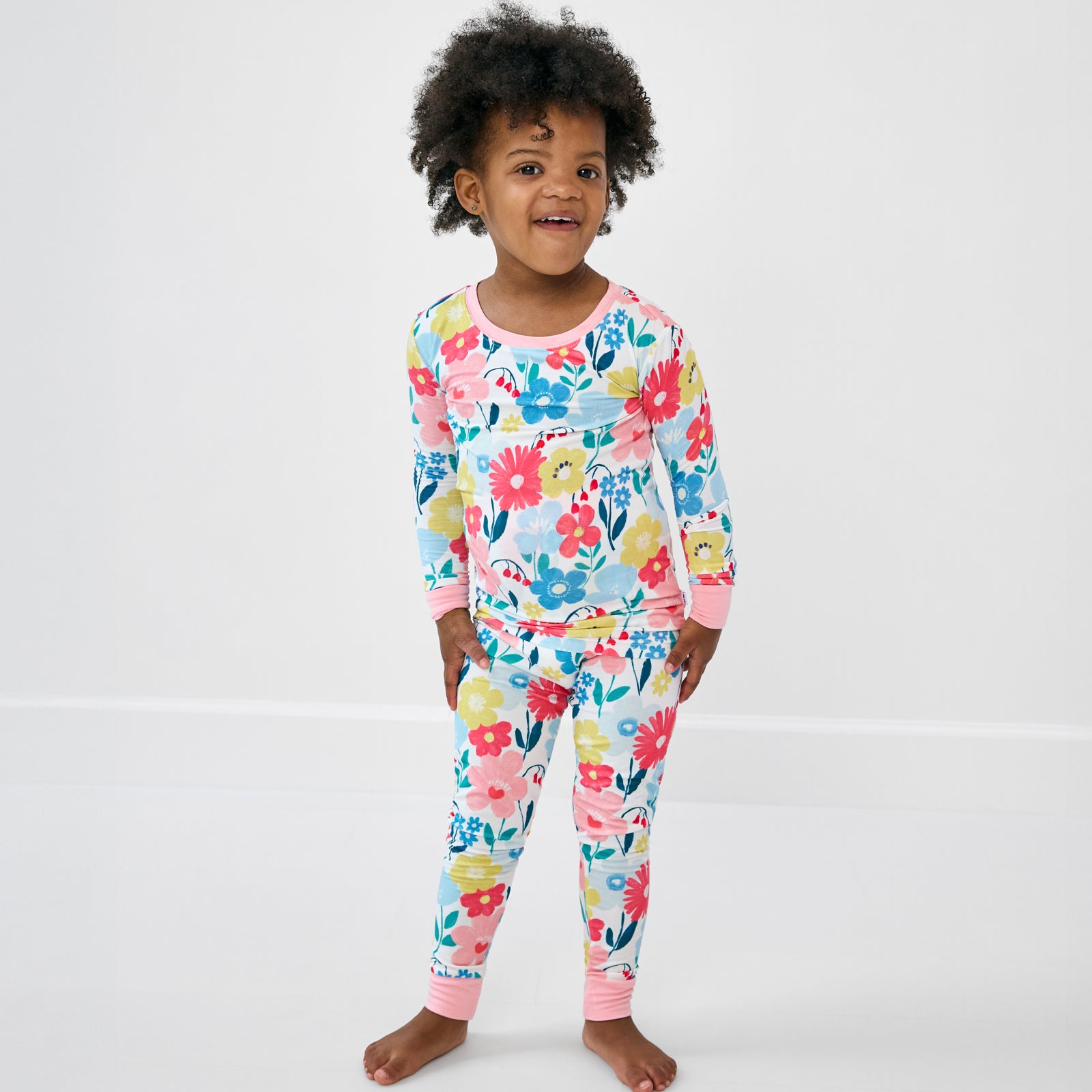 Standing girl wearing the Midsummer Meadow Two-Piece Pajama Set