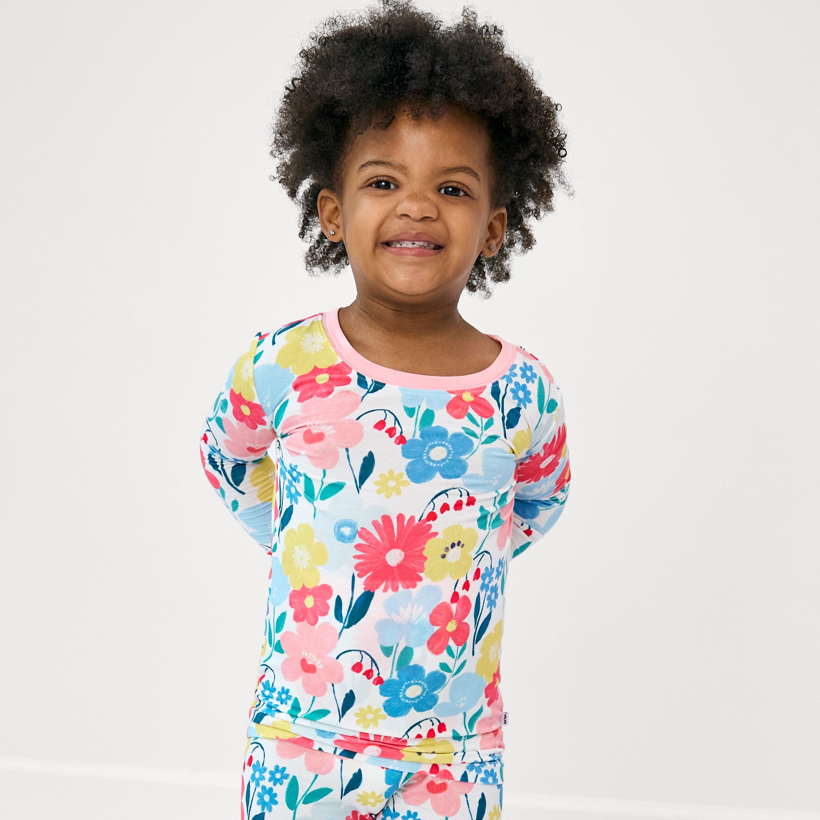 Close up of girl wearing the Midsummer Meadow Two-Piece Pajama Set