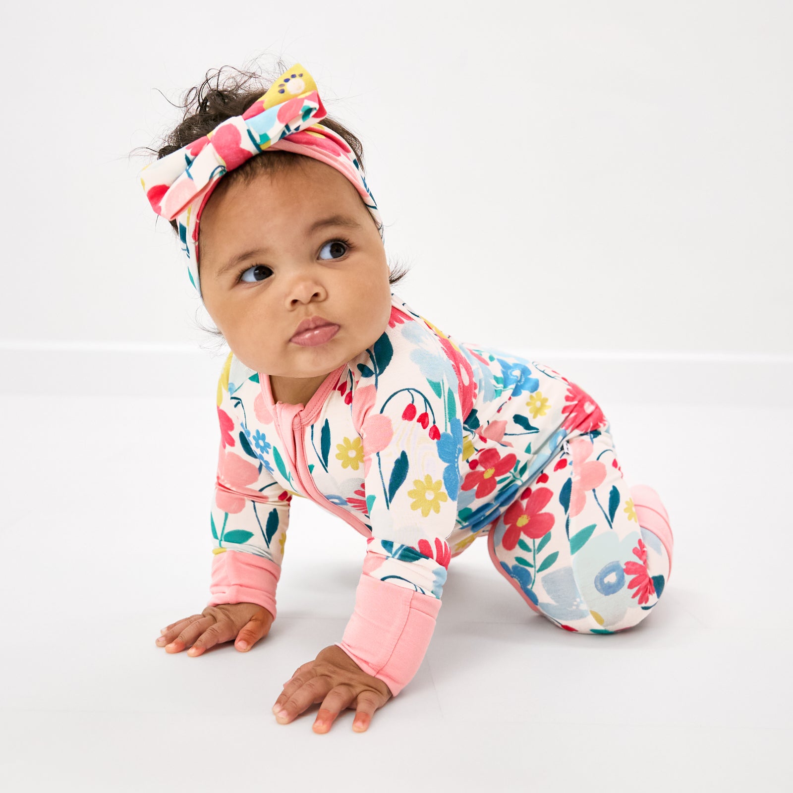 Crawling child wearing the Midsummer Meadow Luxe Bow Headband