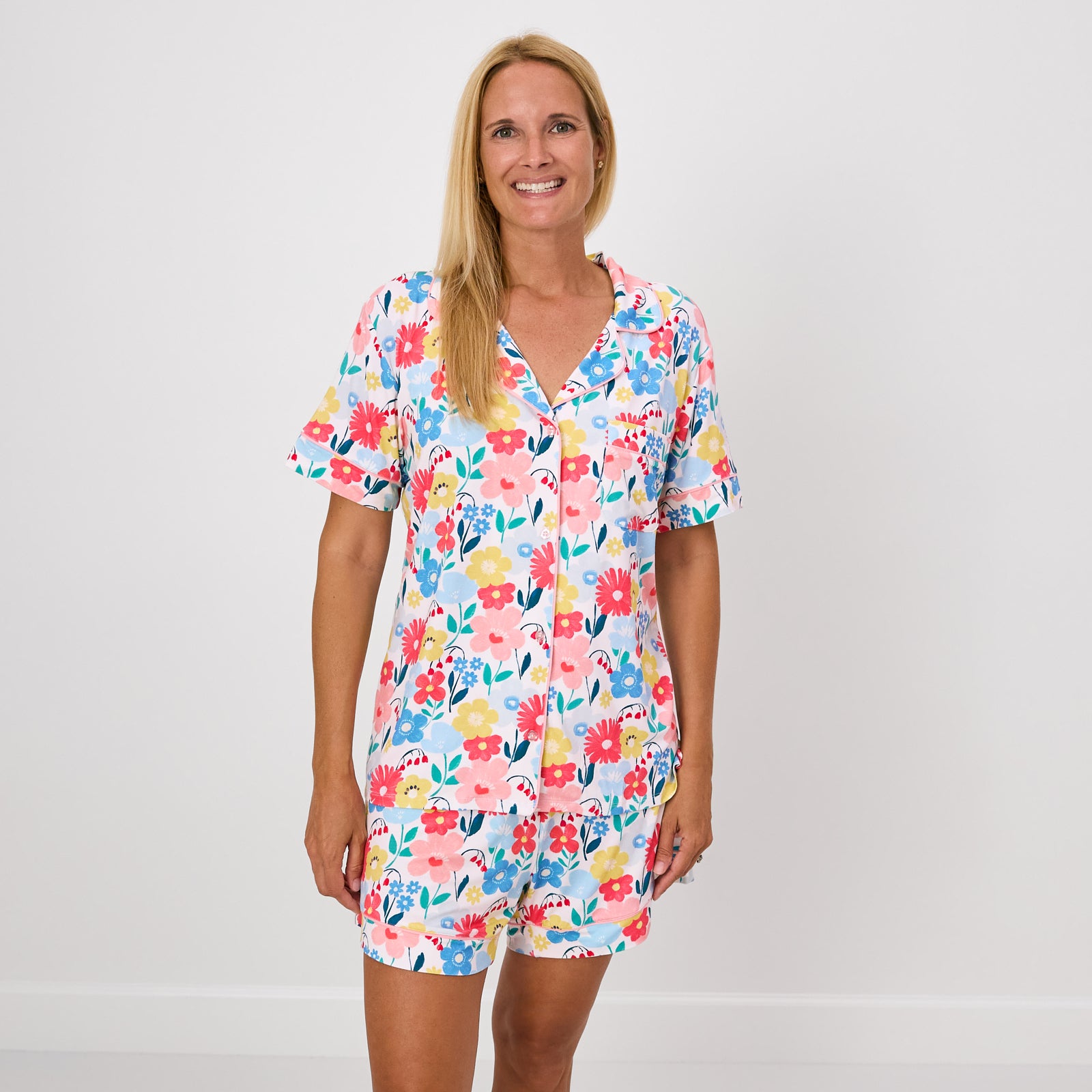 Standing women wearing the Midsummer Meadow Women's Short Sleeve & Shorts Pajama Set