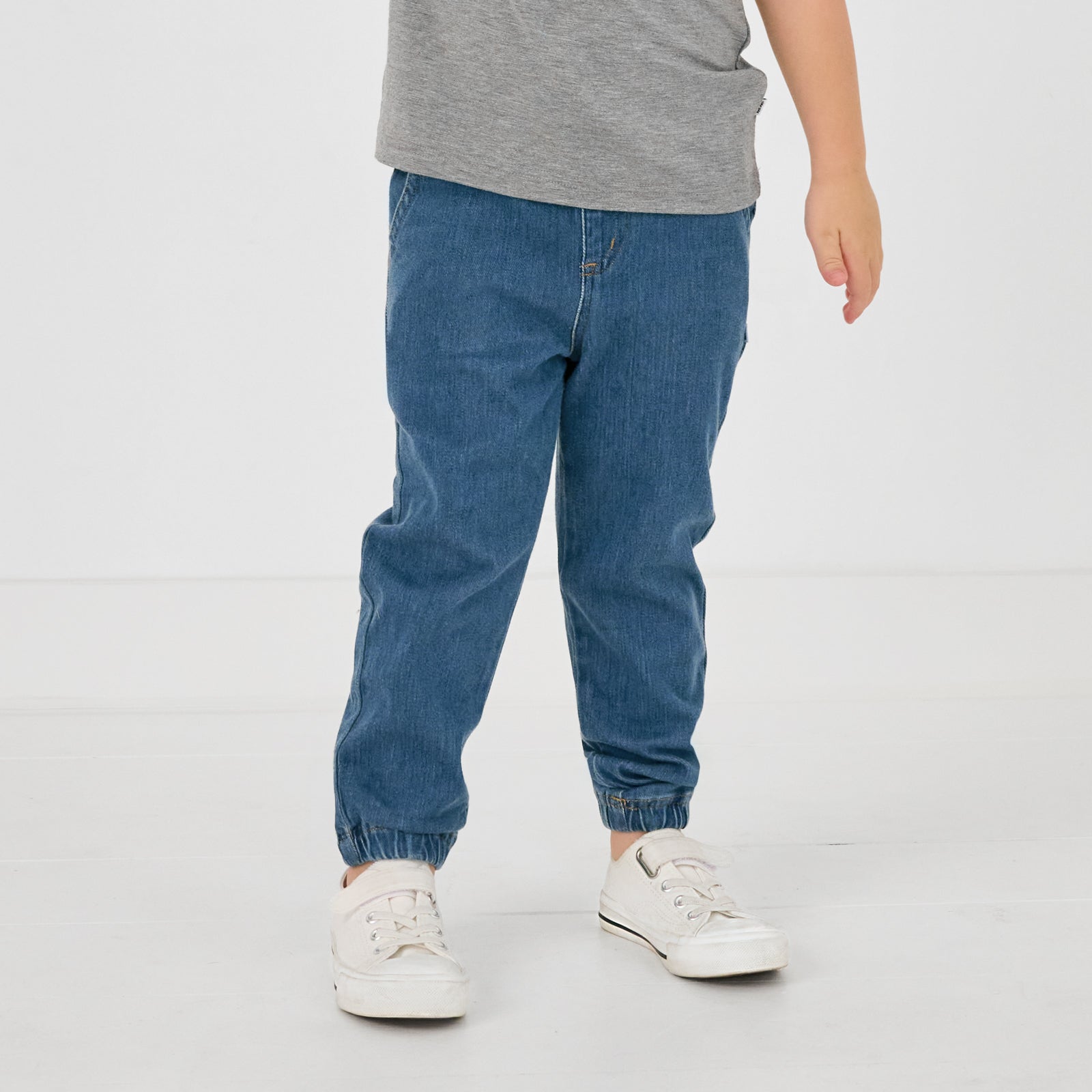 Close up of child wearing the Midwash Blue Denim Jogger for back to school outfits