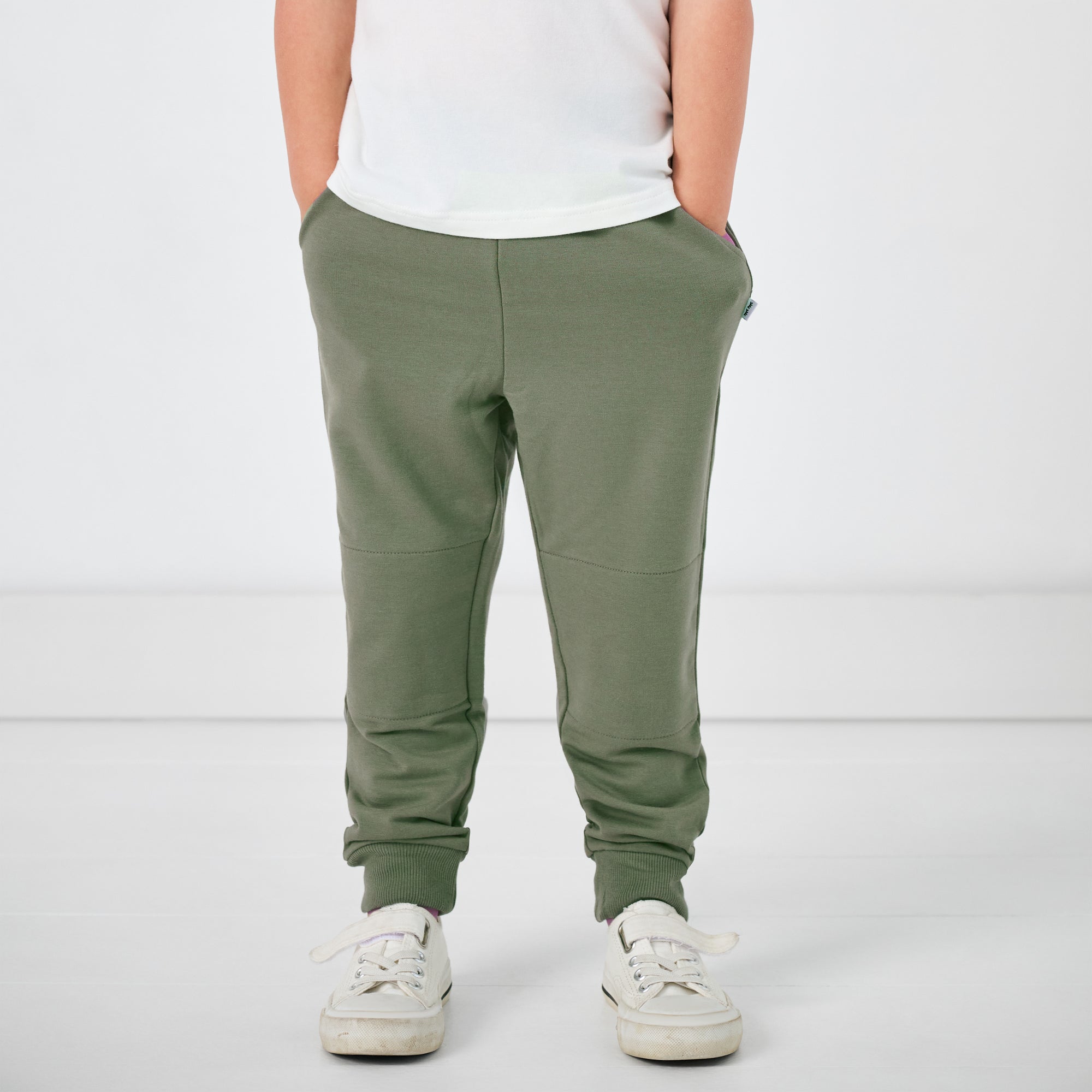 Standing child wearing the Moss Jogger