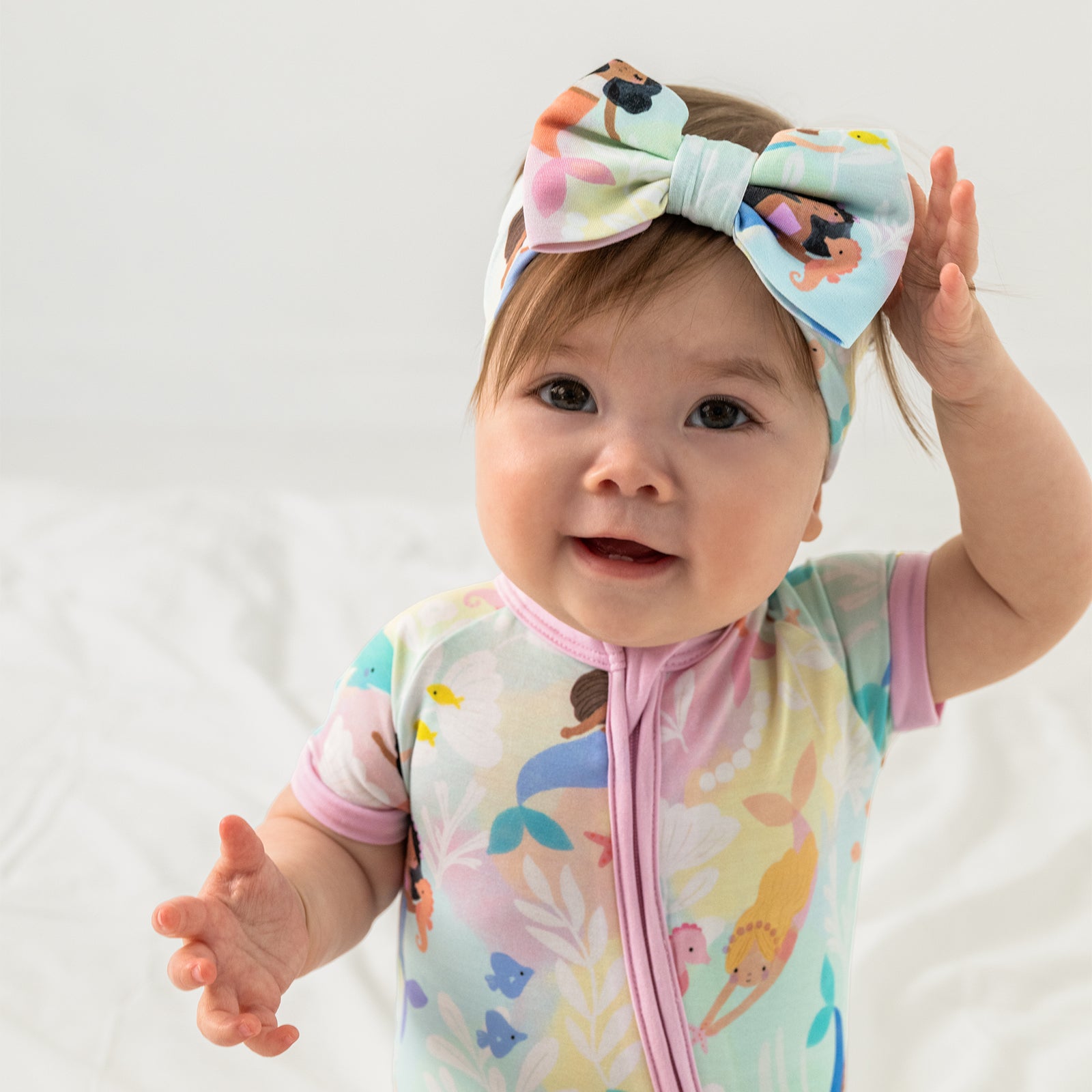 Child wearing the Mystic Mermaids Luxe Bow Headband