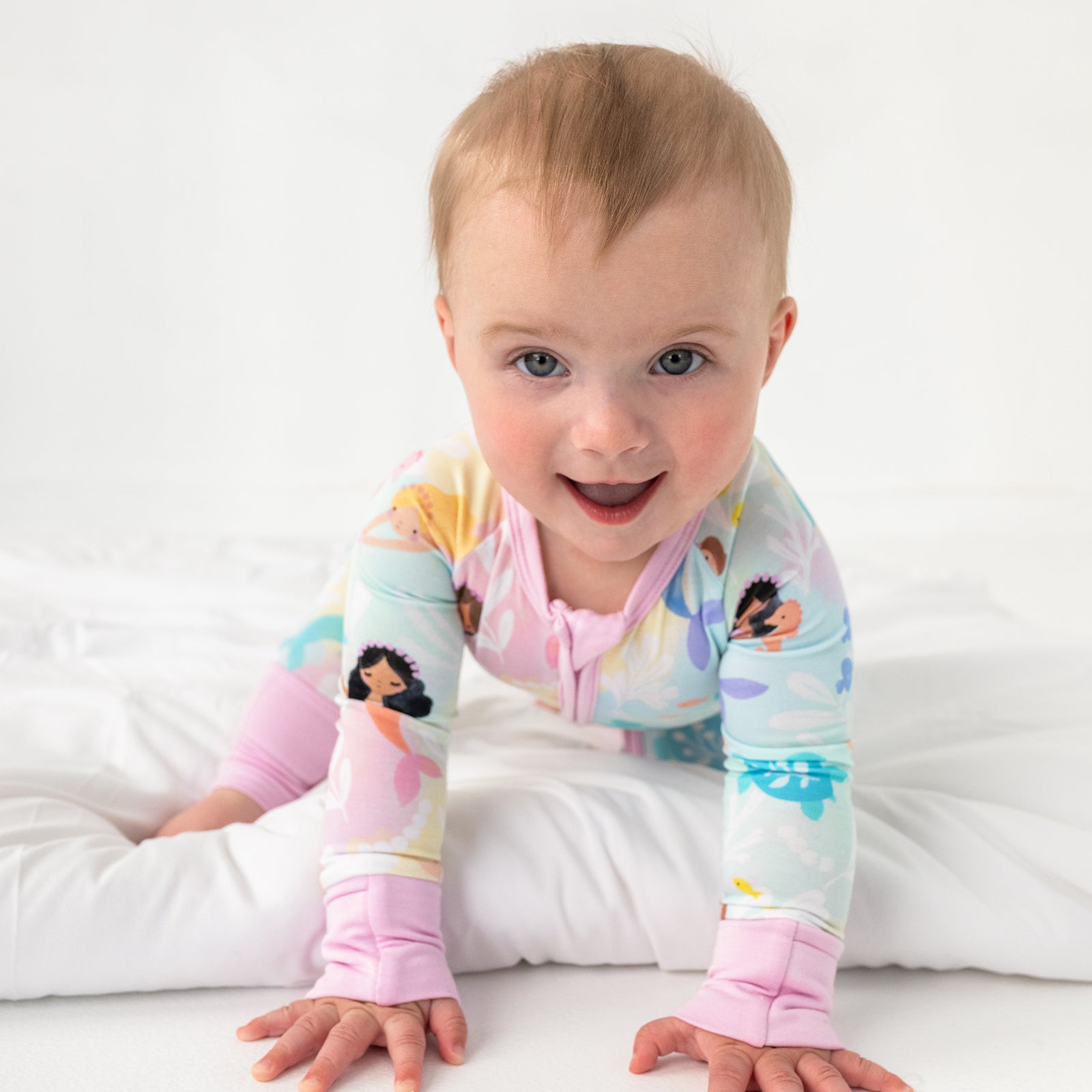 Crawling child wearing the Mystic Mermaids Zippy