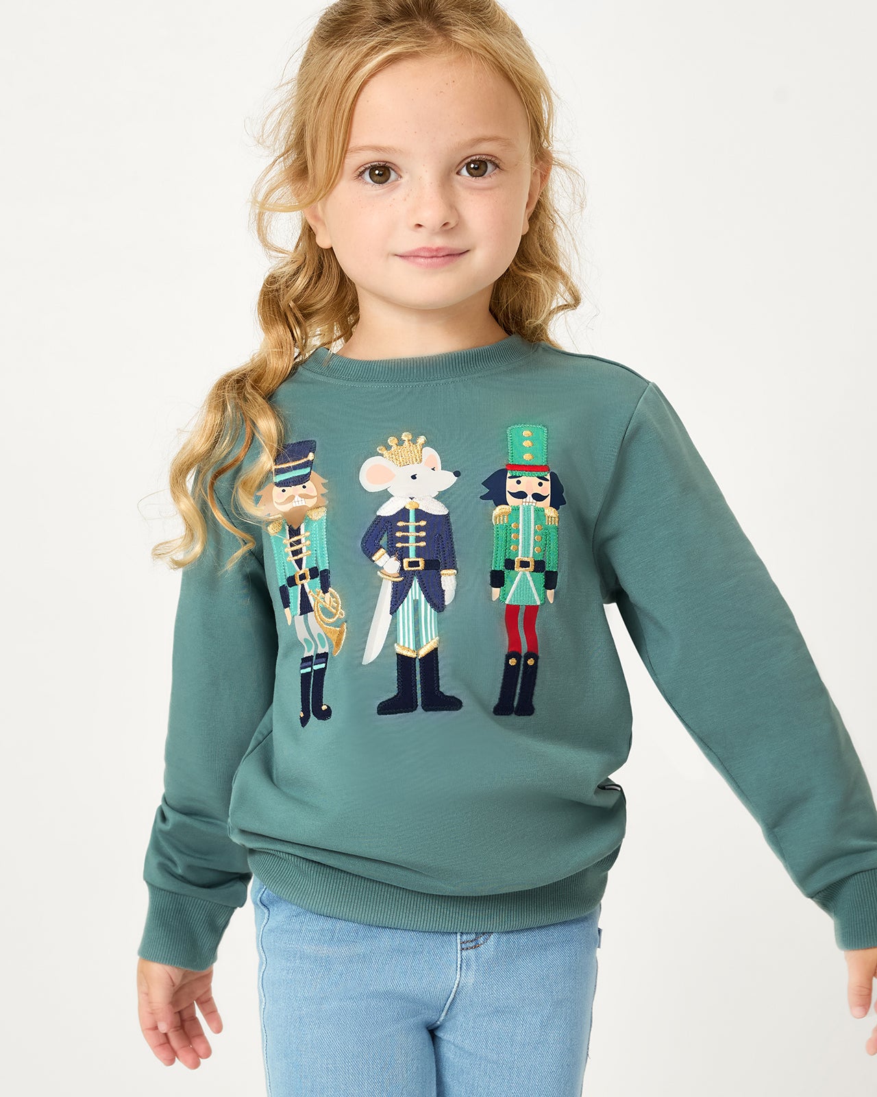 Girl wearing the Nutcracker Crewneck Sweatshirt
