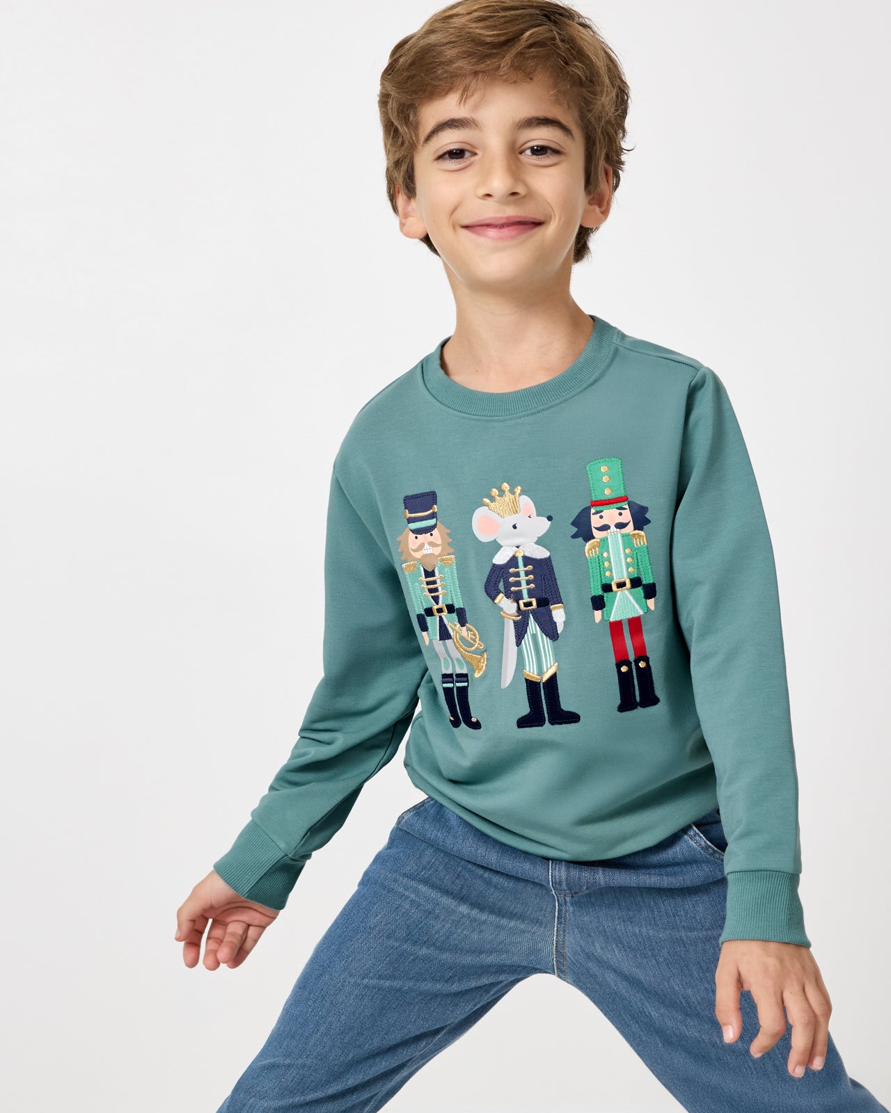 Close up of boy wearing the Nutcracker Crewneck Sweatshirt