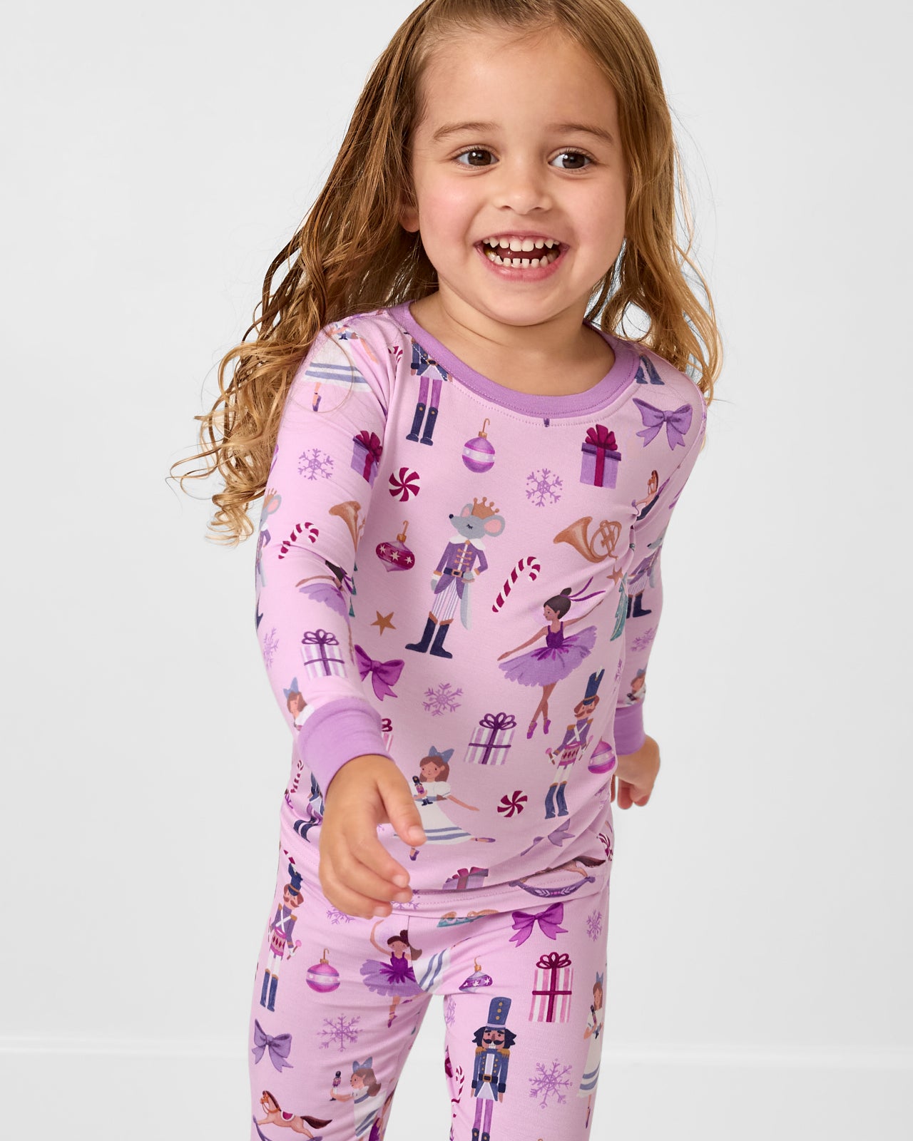 Close up of girl wearing the Nutcracker Ballet Two-Piece Pajama Set