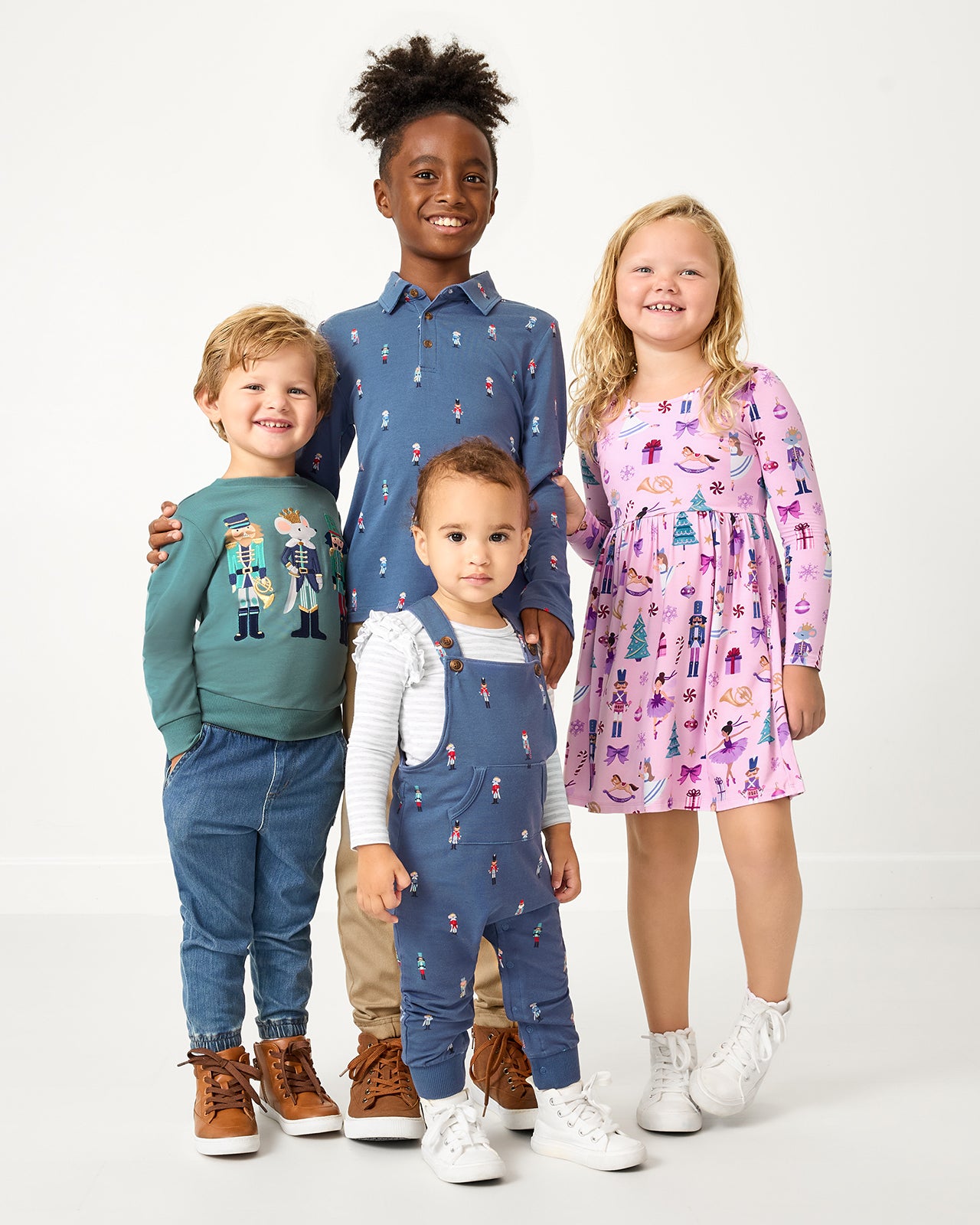 Group of four children wearing styles from the Nutcracker Play collection