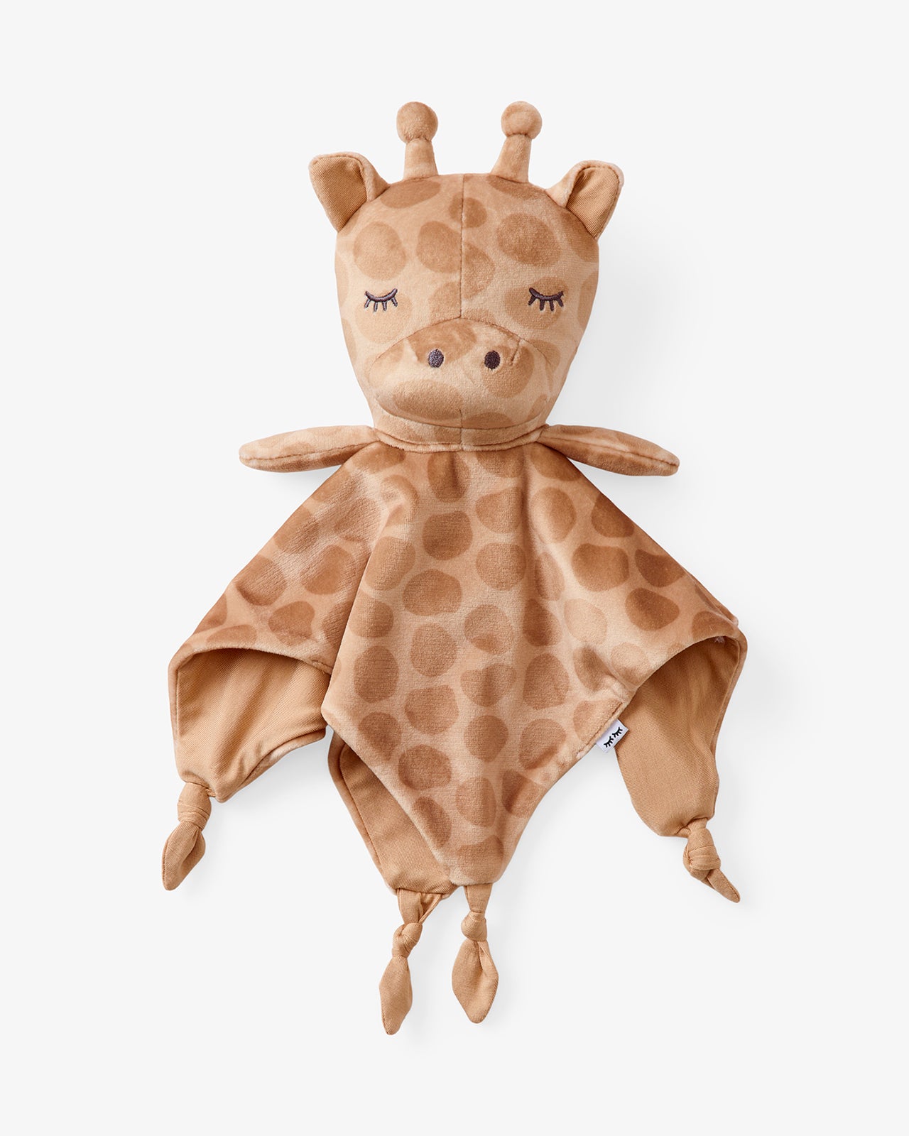 Flat lay of the Giraffe Sleepyhead Lovey