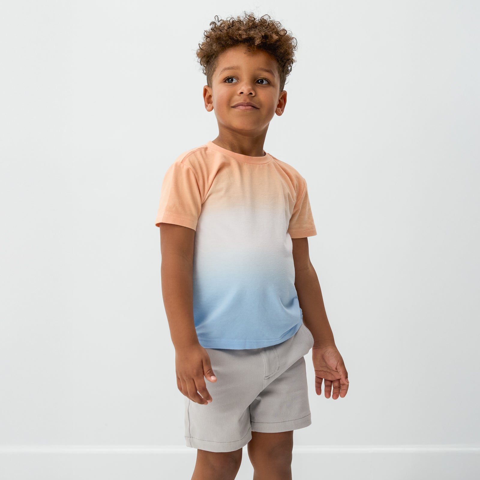 Alternate of child wearing the Orange Crush Relaxed Tee with shorts