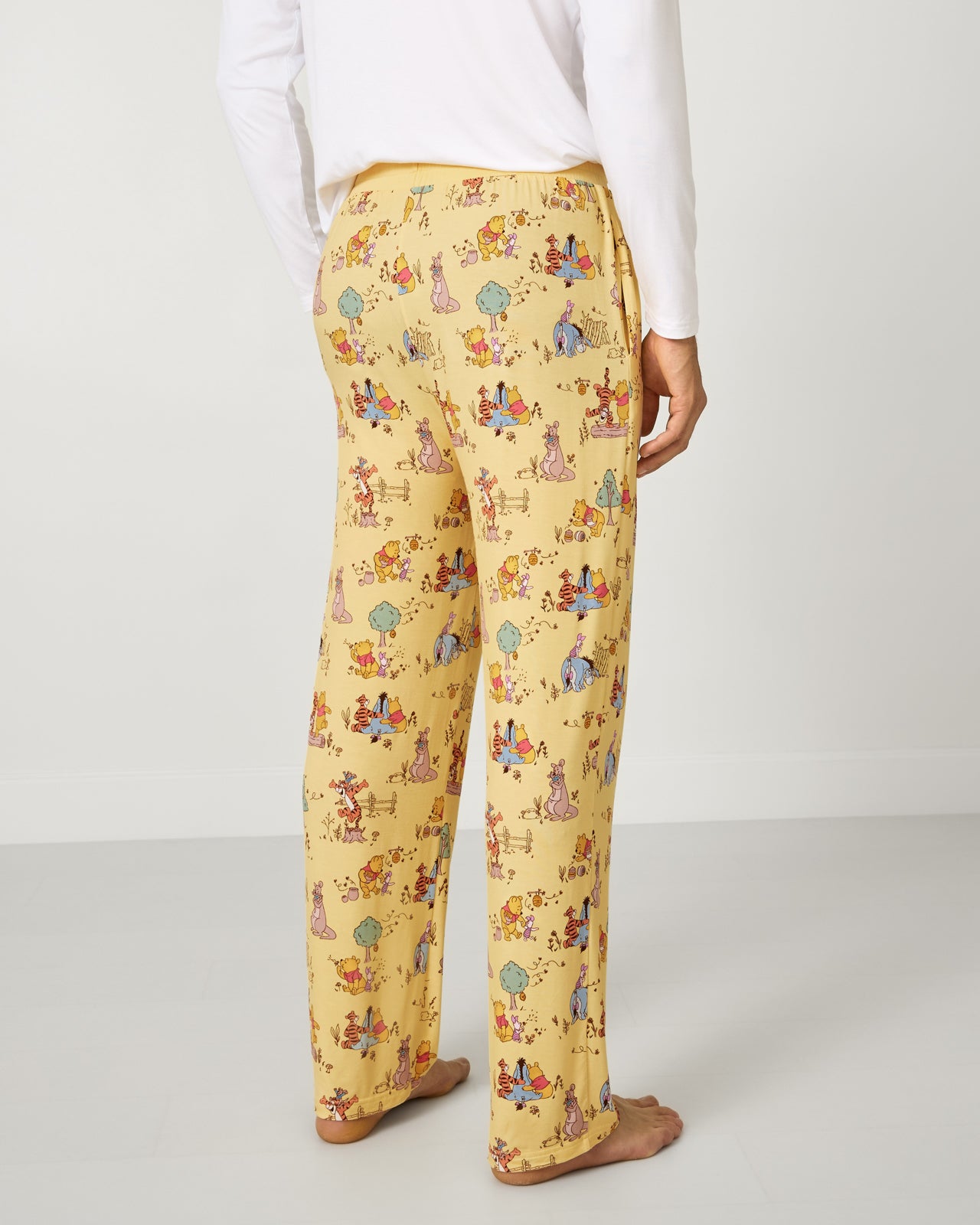 Back view of man wearing the Disney Playtime With Pooh Men's Pajama Pants