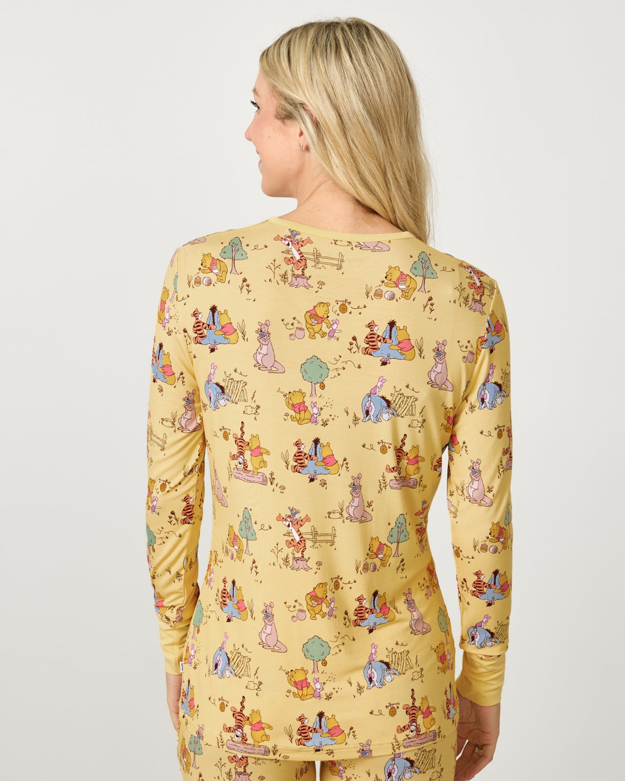 Back view of woman wearing the Disney Playtime With Pooh Women's Pajama Top