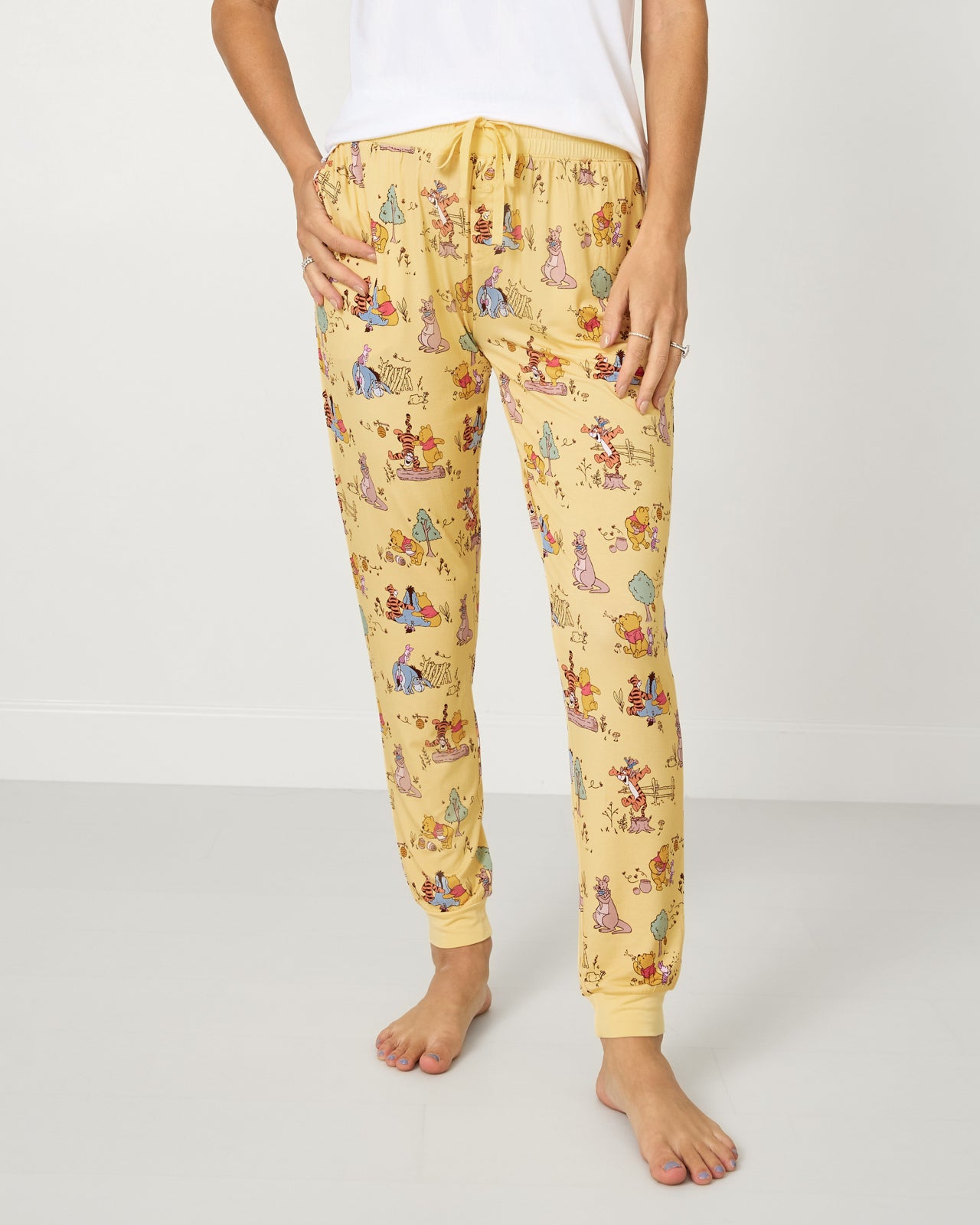 Woman wearing the Disney Playtime With Pooh Women's Pajama Pants
