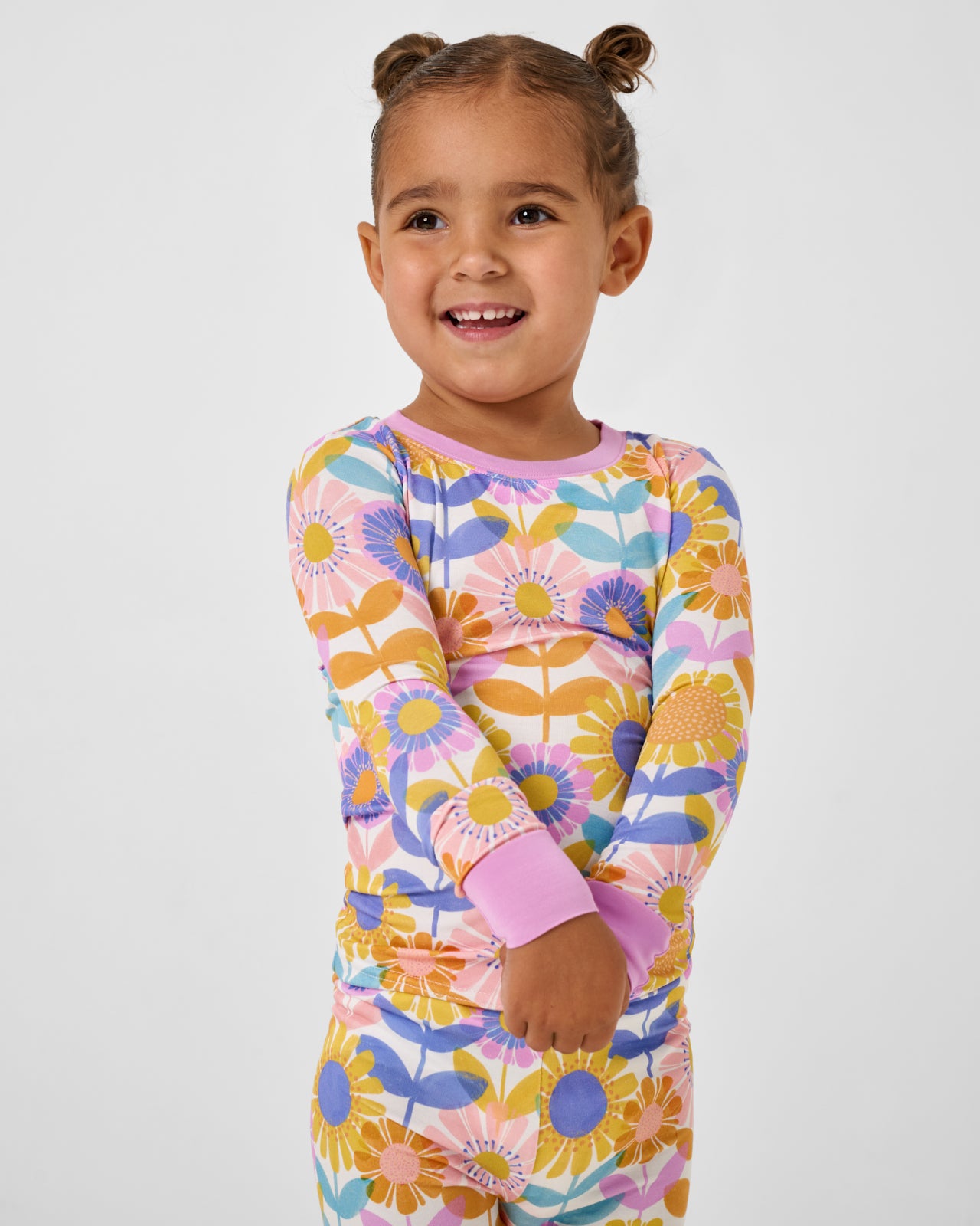 Close up of girl wearing the Petal Power Two-Piece Pajama Set