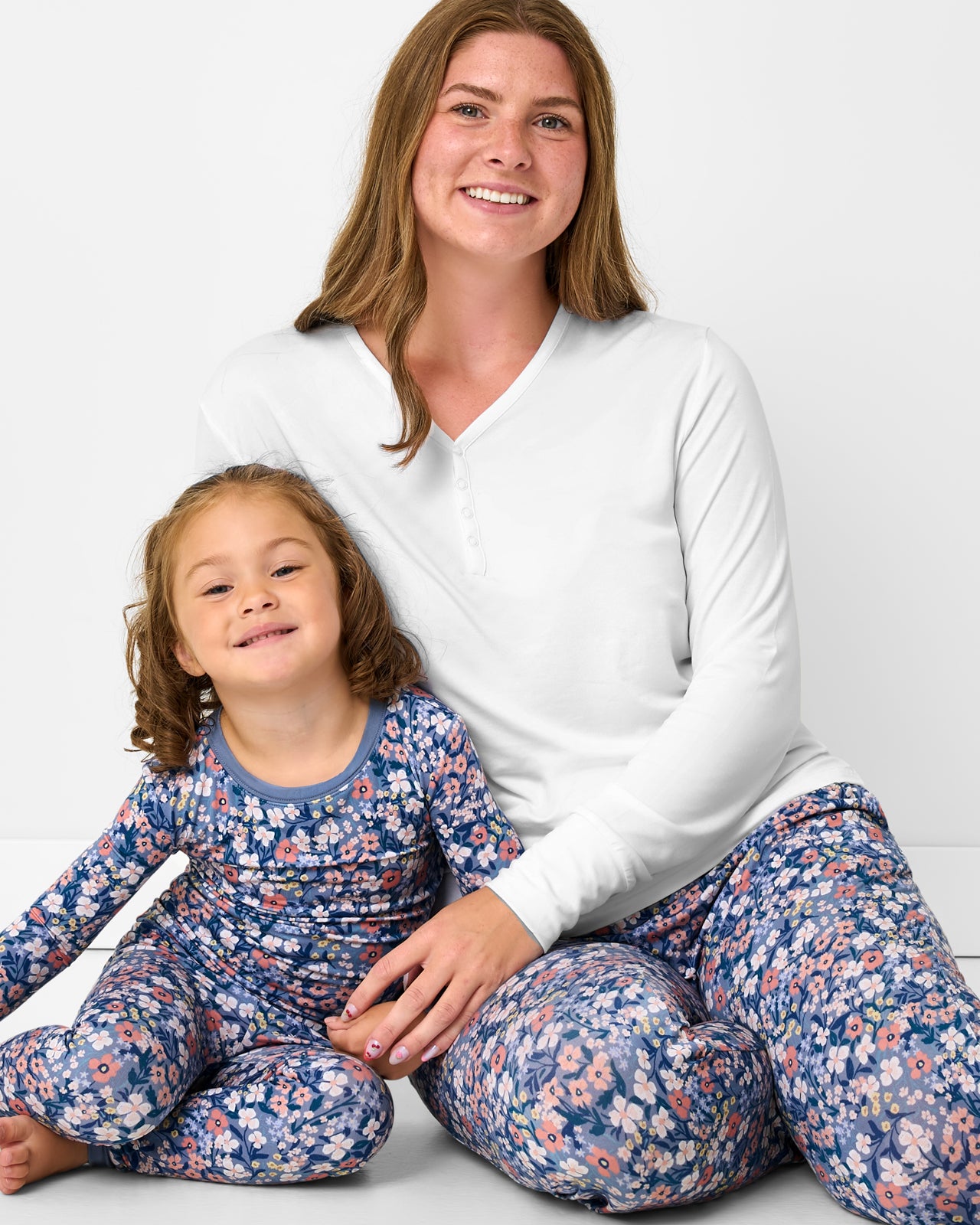 Mother and daughter wearing matching Petite Petals bamboo floral pajamas
