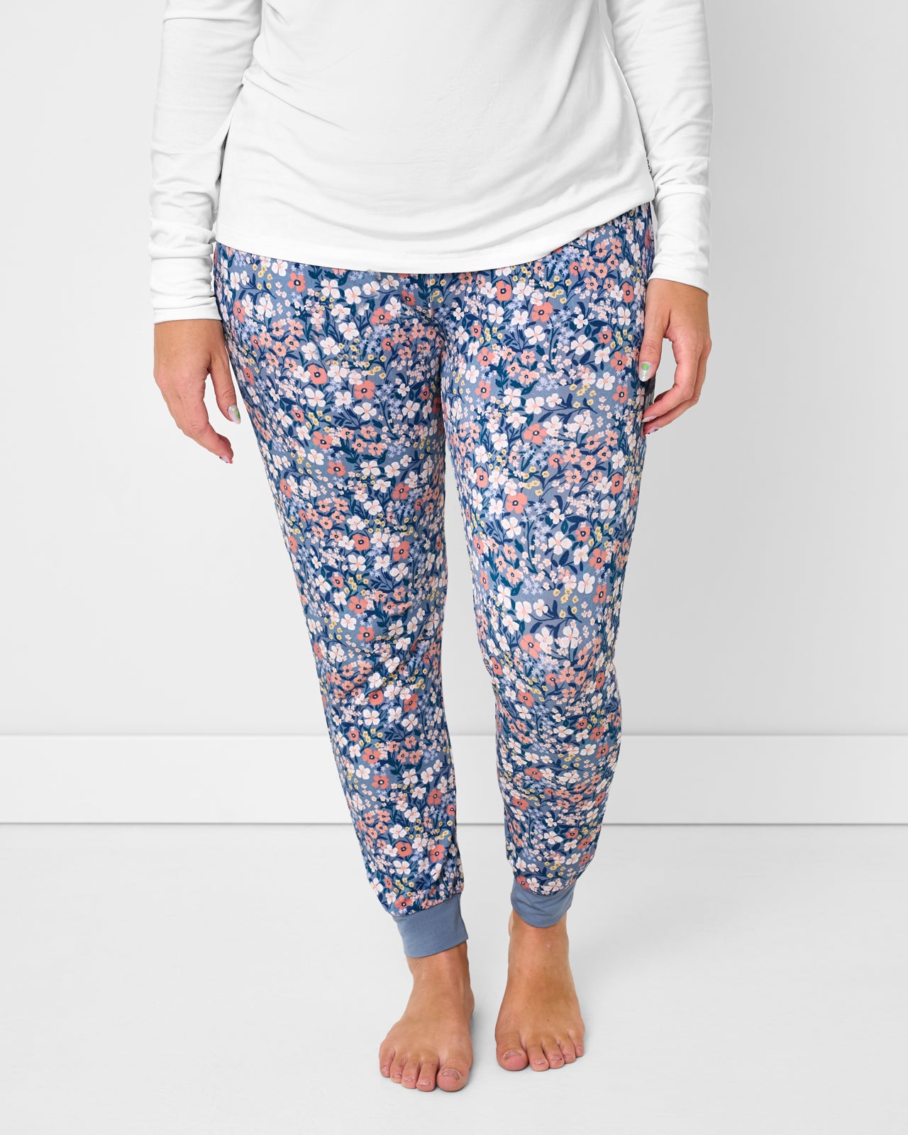 Woman wearing the Petite Petals Women's Pajama Pants