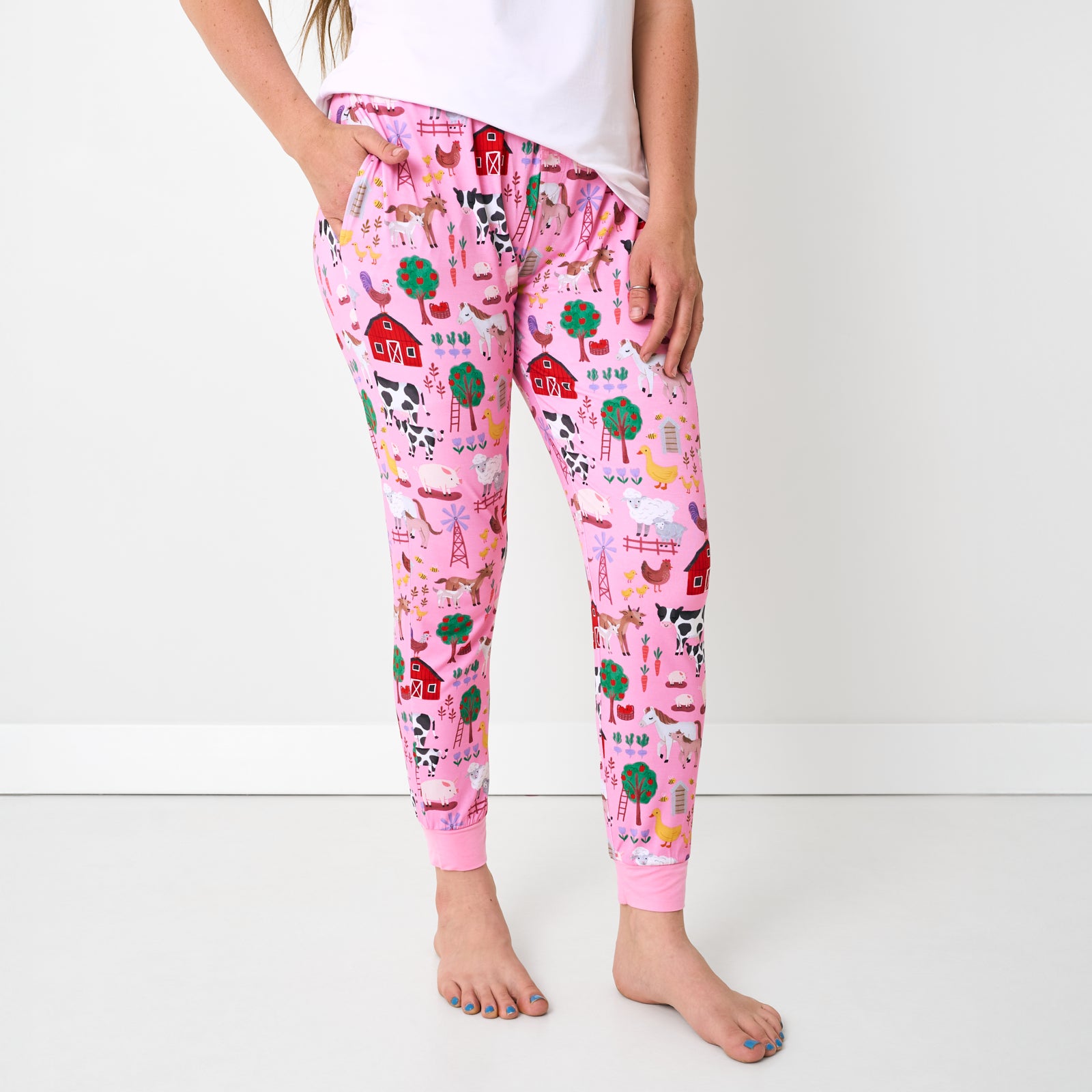 Front view of woman wearing the Pink Farm Fam Women's Pajama Pants