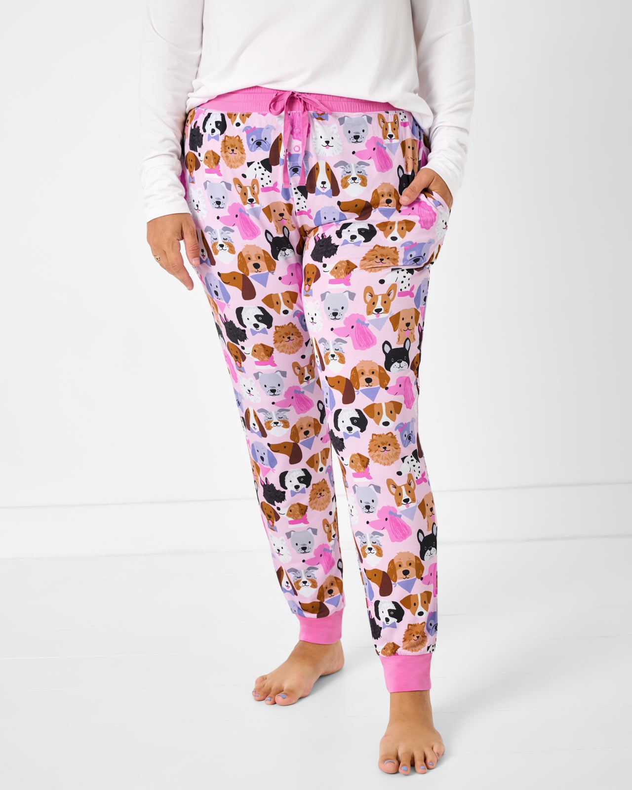 Woman wearing the Pink Puppy Parade Women's Pajama Pants