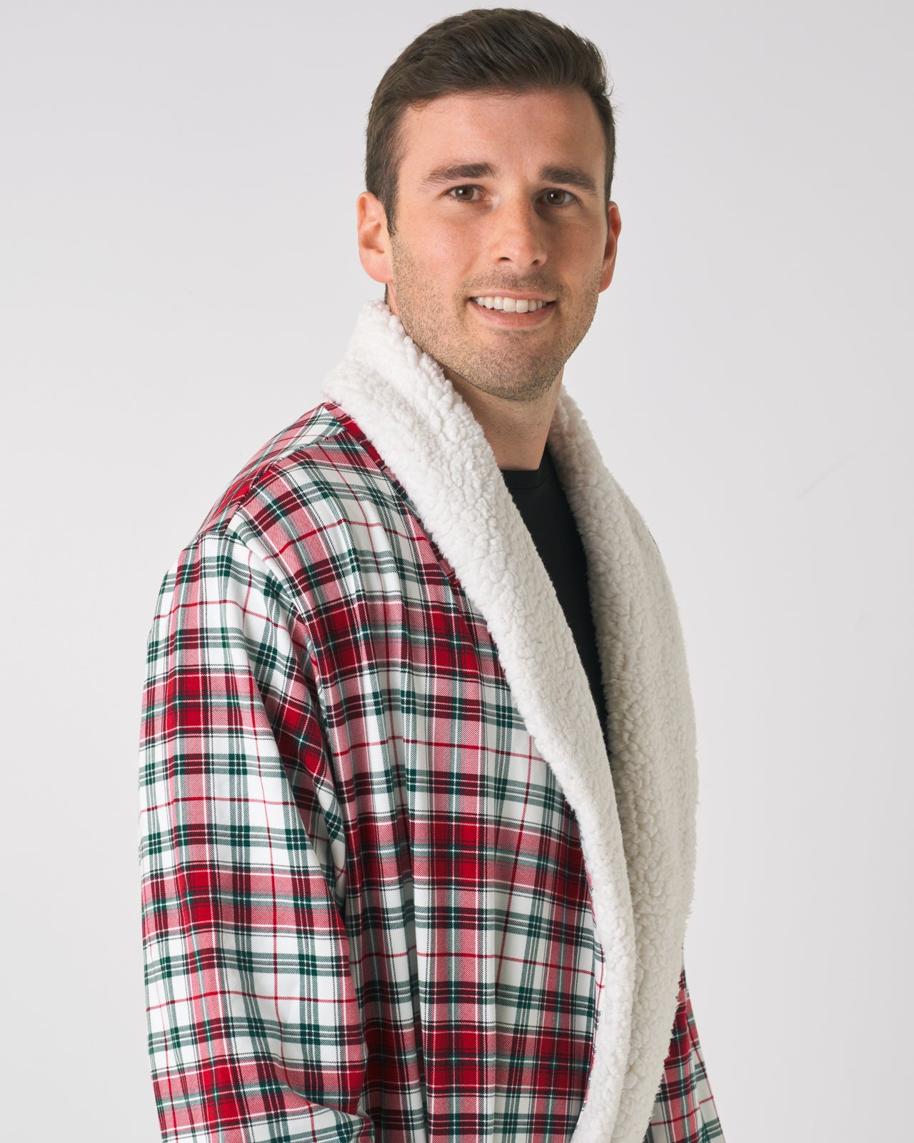 Close up shot of Man standing wearing the Holly Plaid Cozy Robe.
