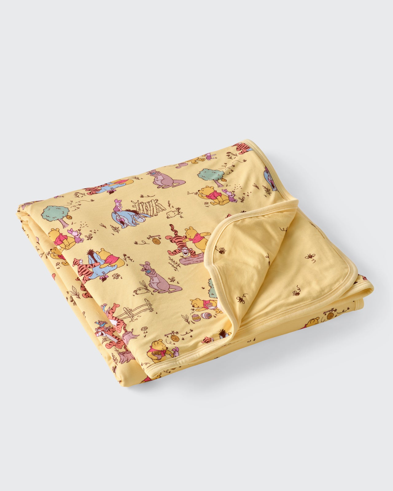 Flat lay of the Disney Playtime With Pooh Large Cloud Blanket®