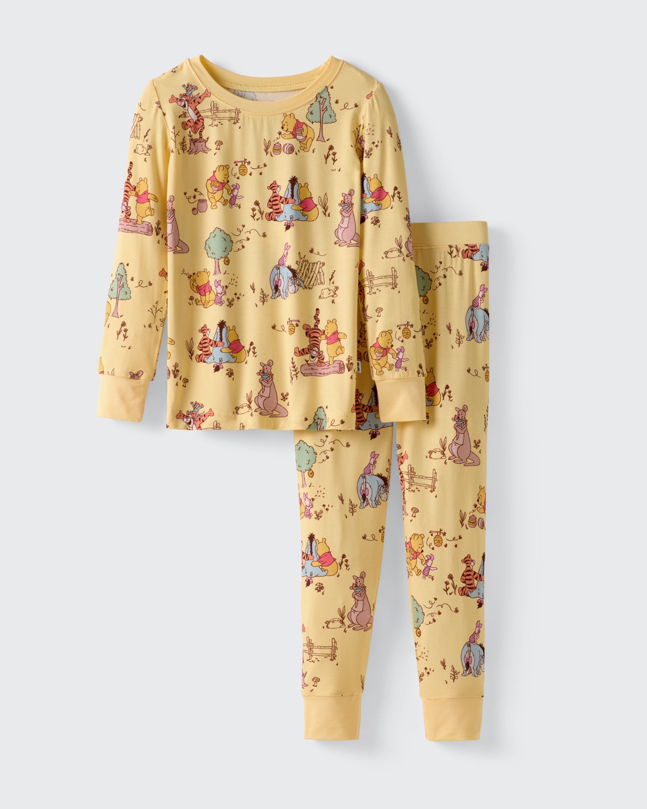 Flat lay of the Disney Playtime With Pooh Two-Piece Pajama Set
