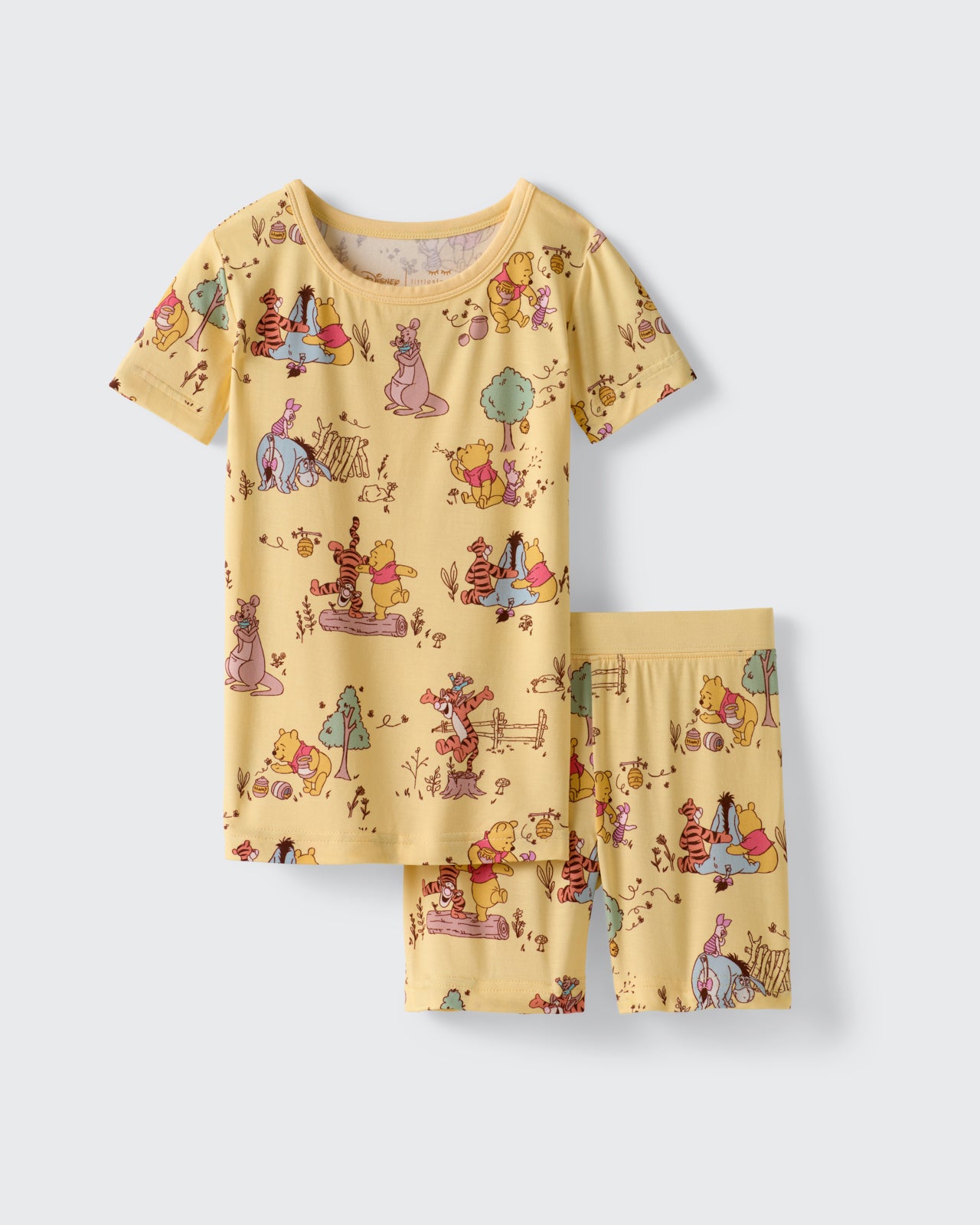 Flat lay of the Disney Playtime With Pooh Two-Piece Short Sleeve & Shorts Pajama Set