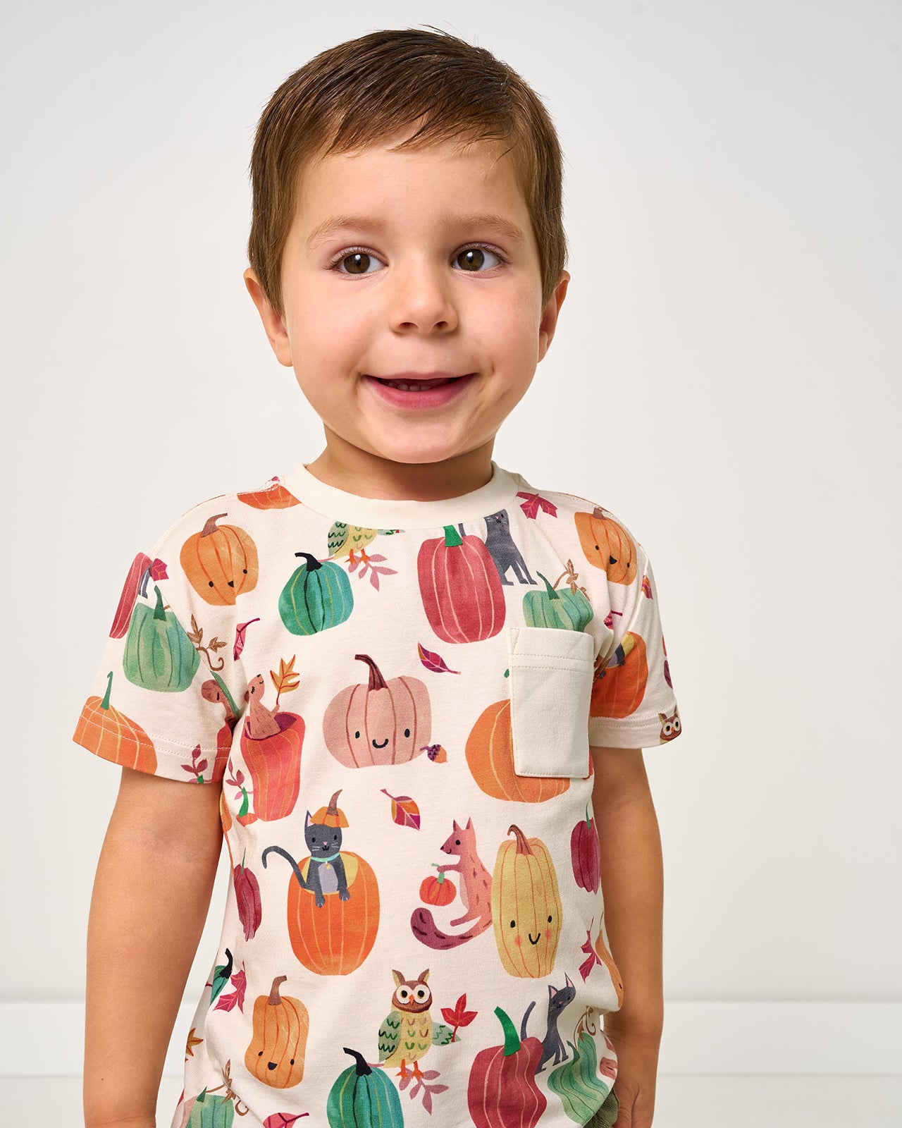 Boy wearing the Pumpkin Pals Relaxed Pocket Tee
