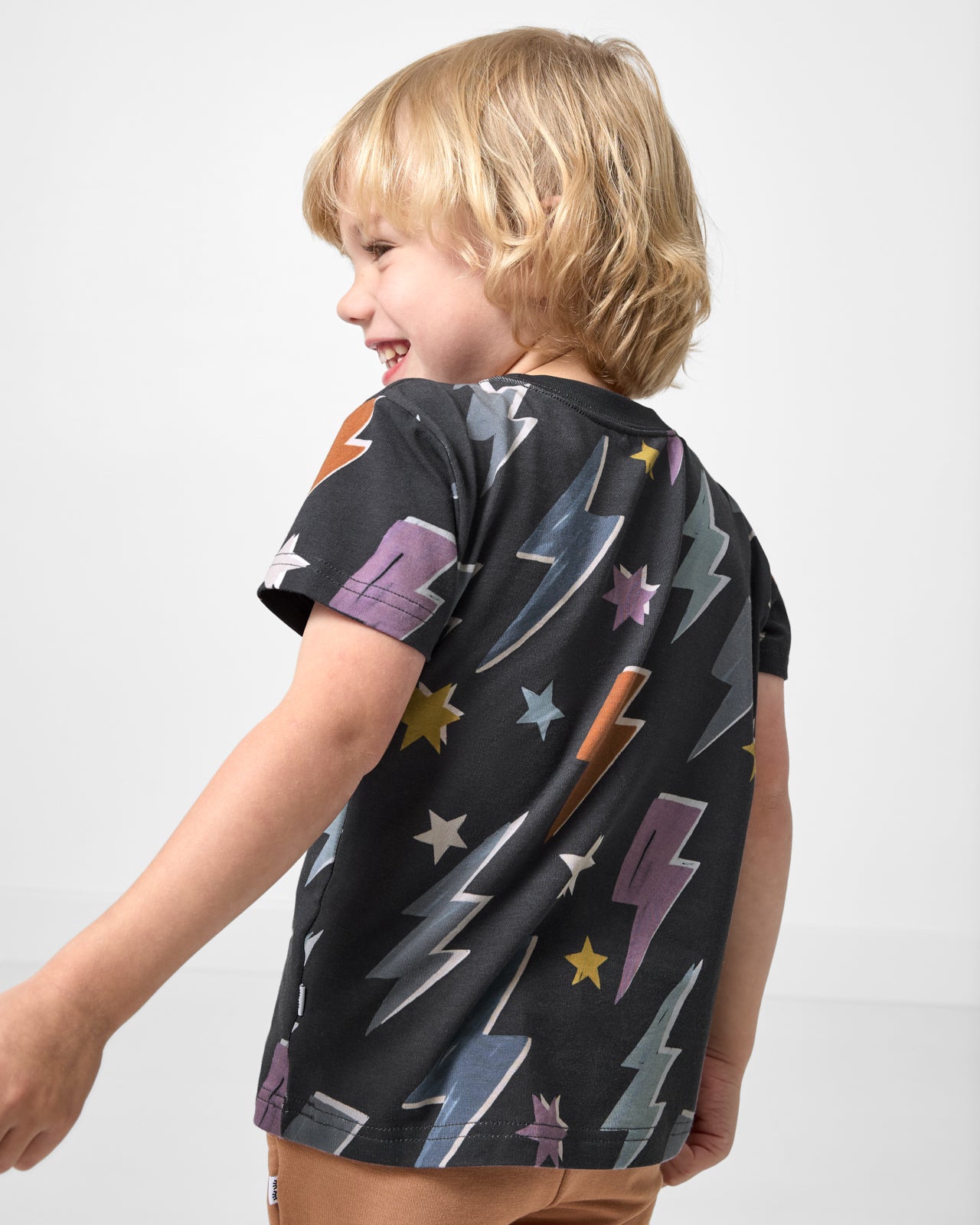 Back view of boy wearing the Rad Bolts Relaxed Tee